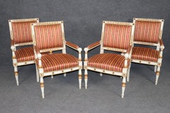 14 Chaises de style Empire à décor peint sculpté et doré par Balzarotti de Paris