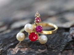 Ruby and multicolored gemstones ring in 14k gold