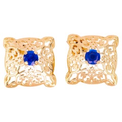 14 K Gold Earrings Studs with Oriental Pattern Set with Central Sapphires
