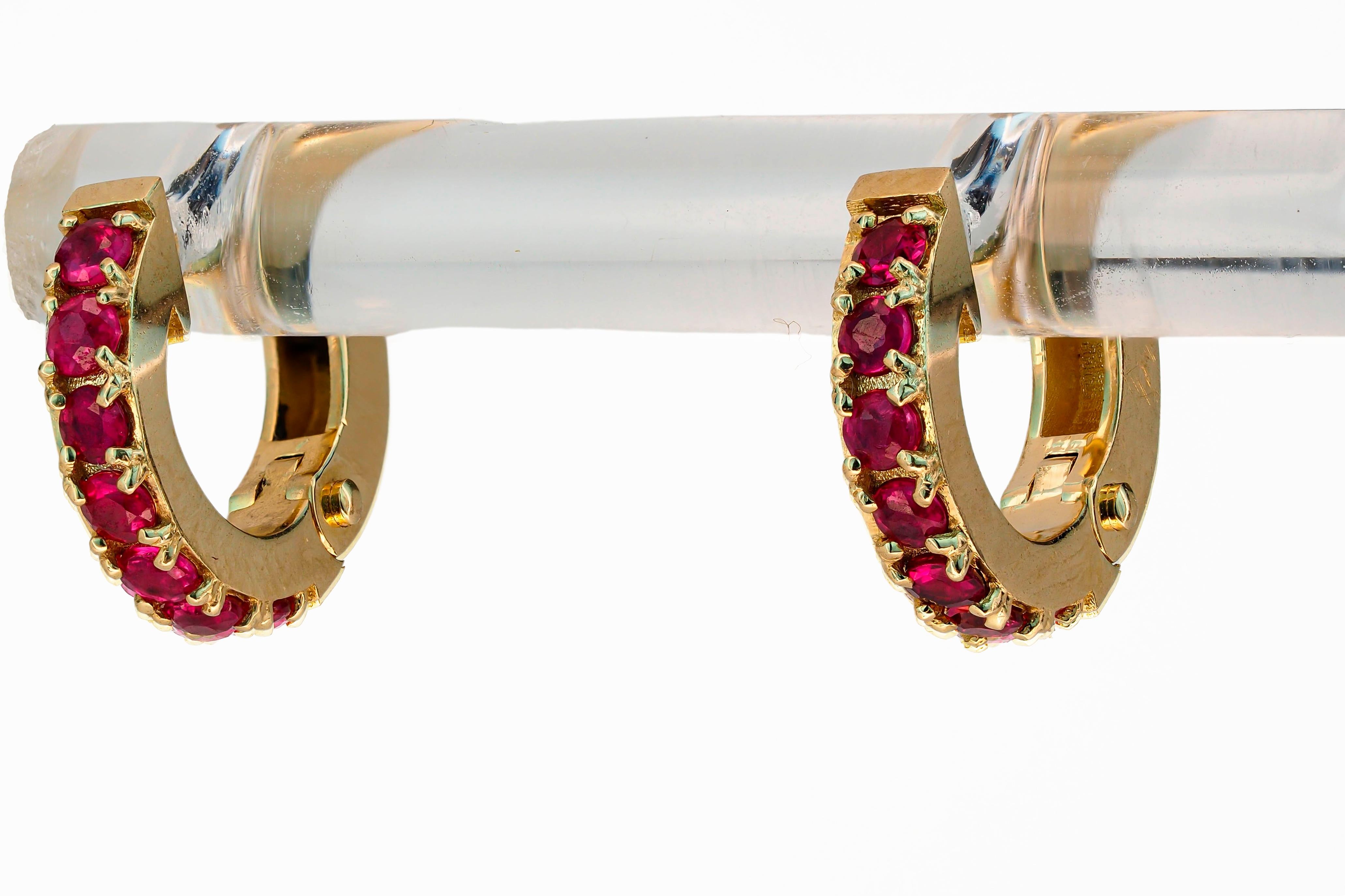 Modern Hoop Earrings with Rubies. Ruby earrings in 14 karat gold.