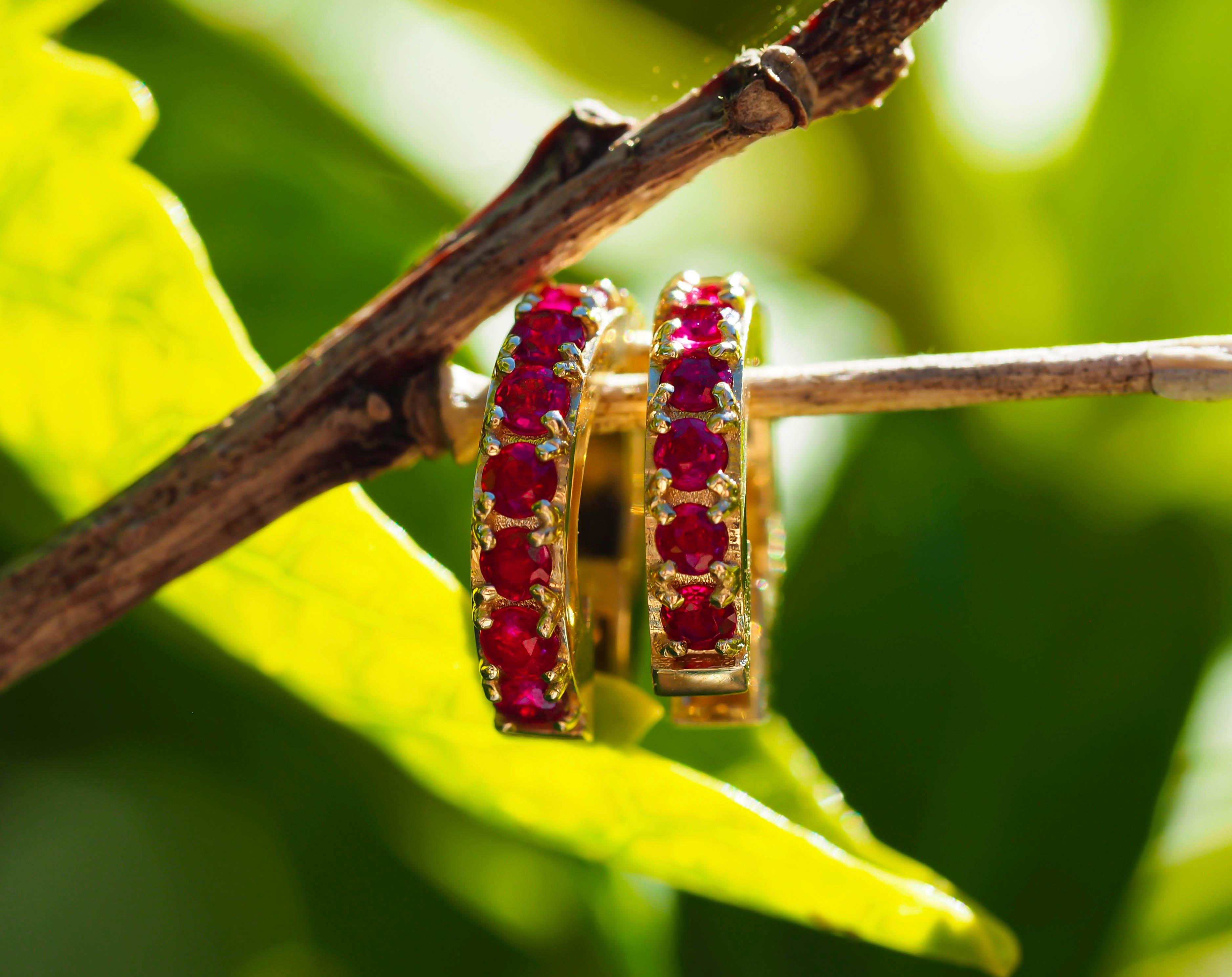 Women's Hoop Earrings with Rubies. Ruby earrings in 14 karat gold.