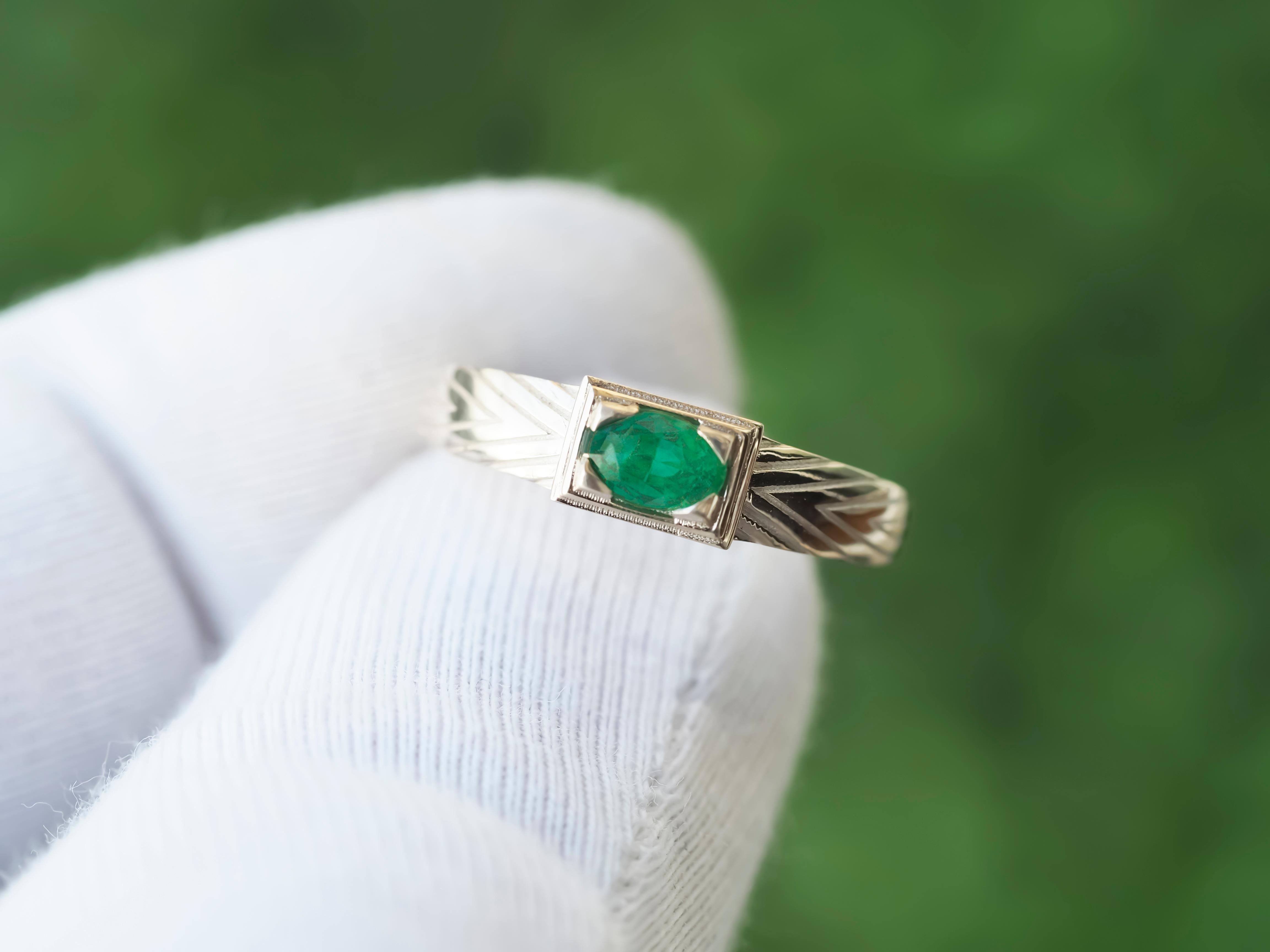 For Sale:  14 K Gold Mens Ring with Emerald 11