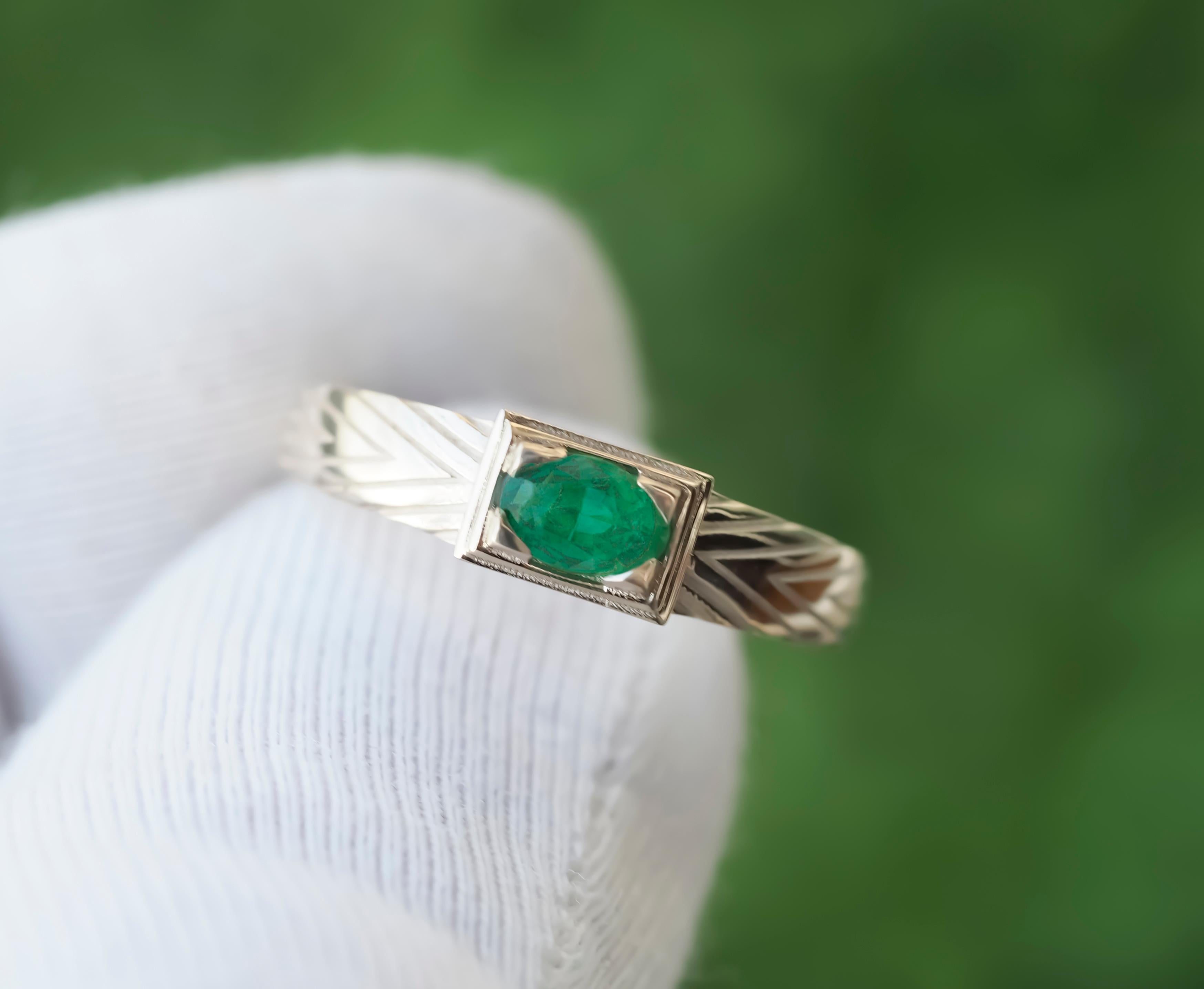 For Sale:  14 K Gold Mens Ring with Emerald 12
