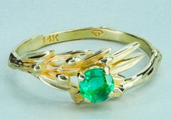 14 K Gold Olive Ring with Round Emerald