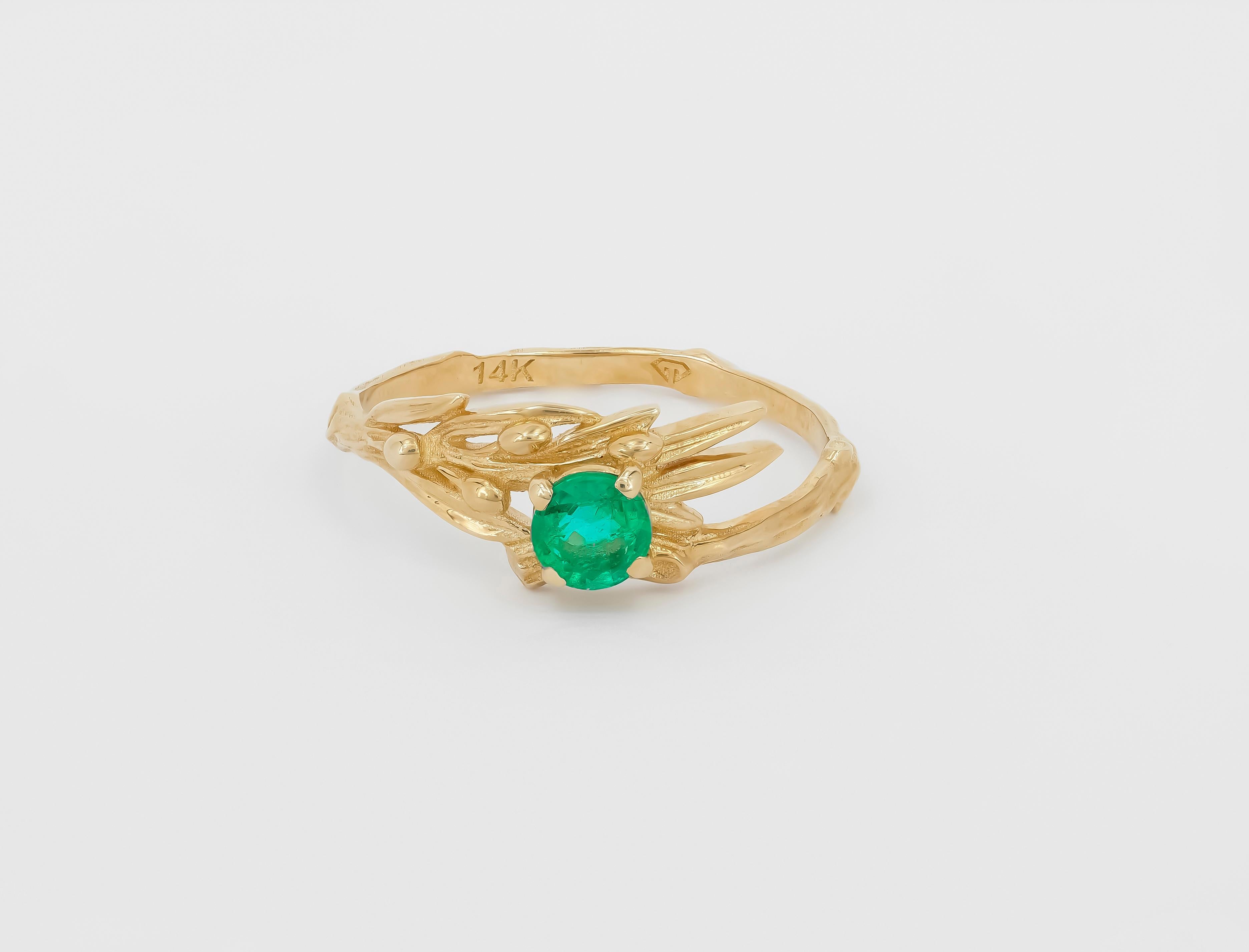14 kt solid gold ring with natural emerald. May birthstone. Olive tree design yellow gold ring with emerald.
Weight approx. 1.70 g.

Central stone: Natural emerald
Cut: Round
Weight: approx 0.55 ct.
Color: Green
Clarity: Transparent with