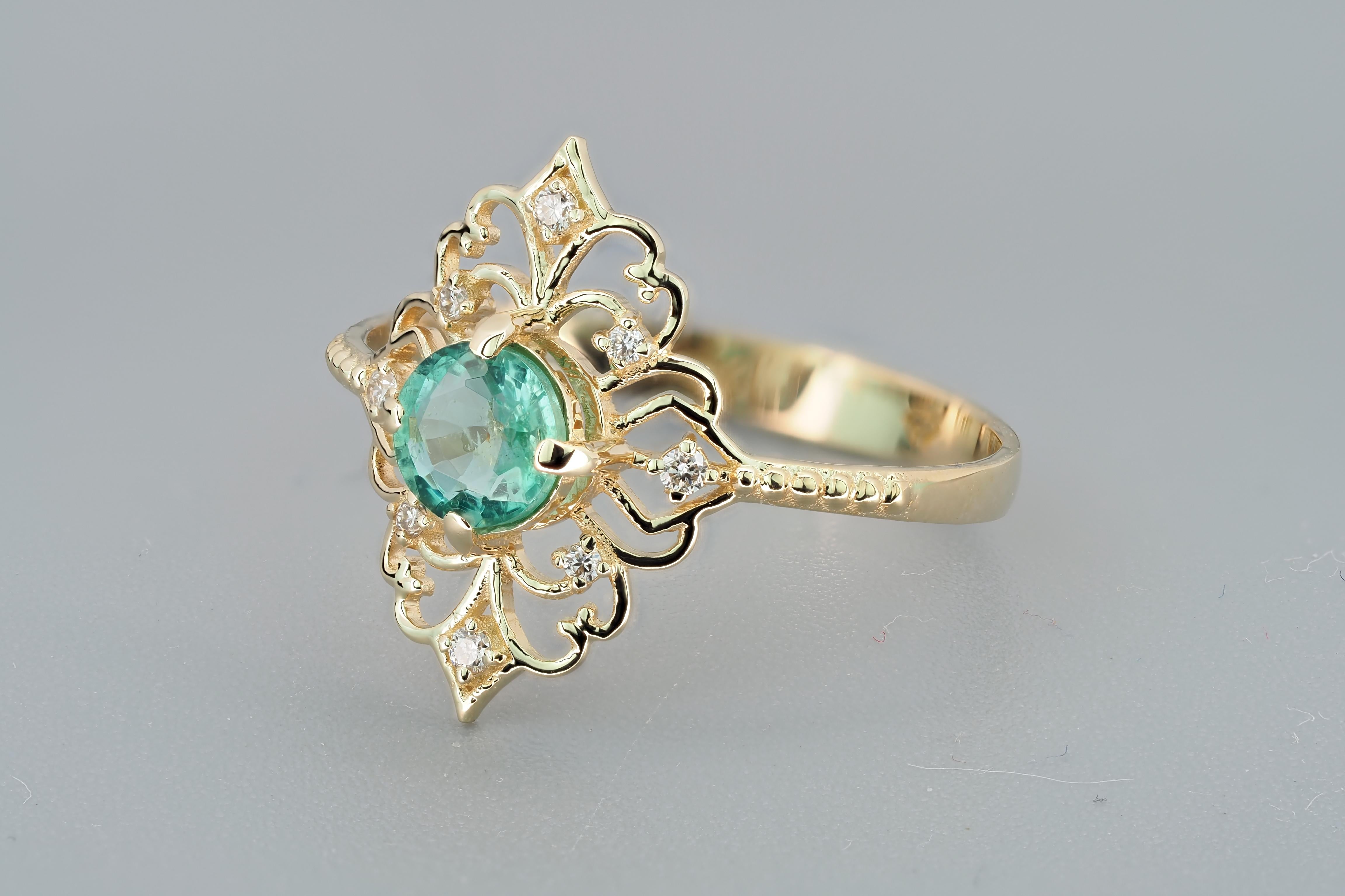For Sale:  14 K Gold Ring with Emerald and Diamonds 8