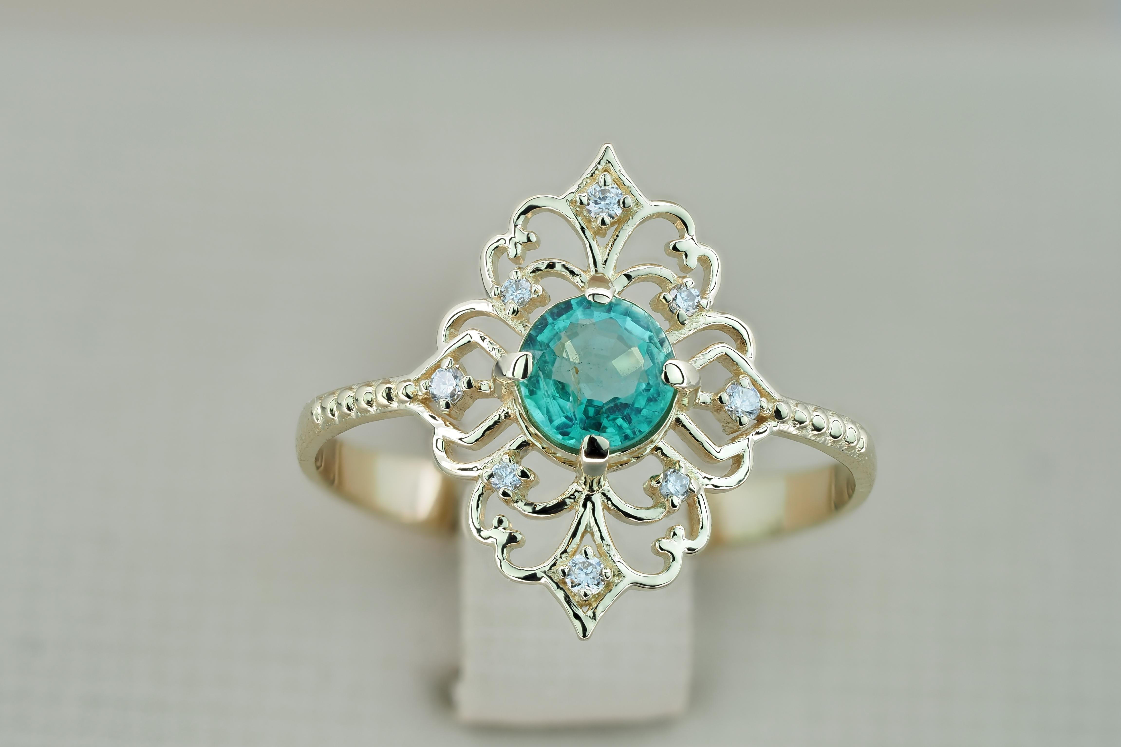 For Sale:  14 K Gold Ring with Emerald and Diamonds 10