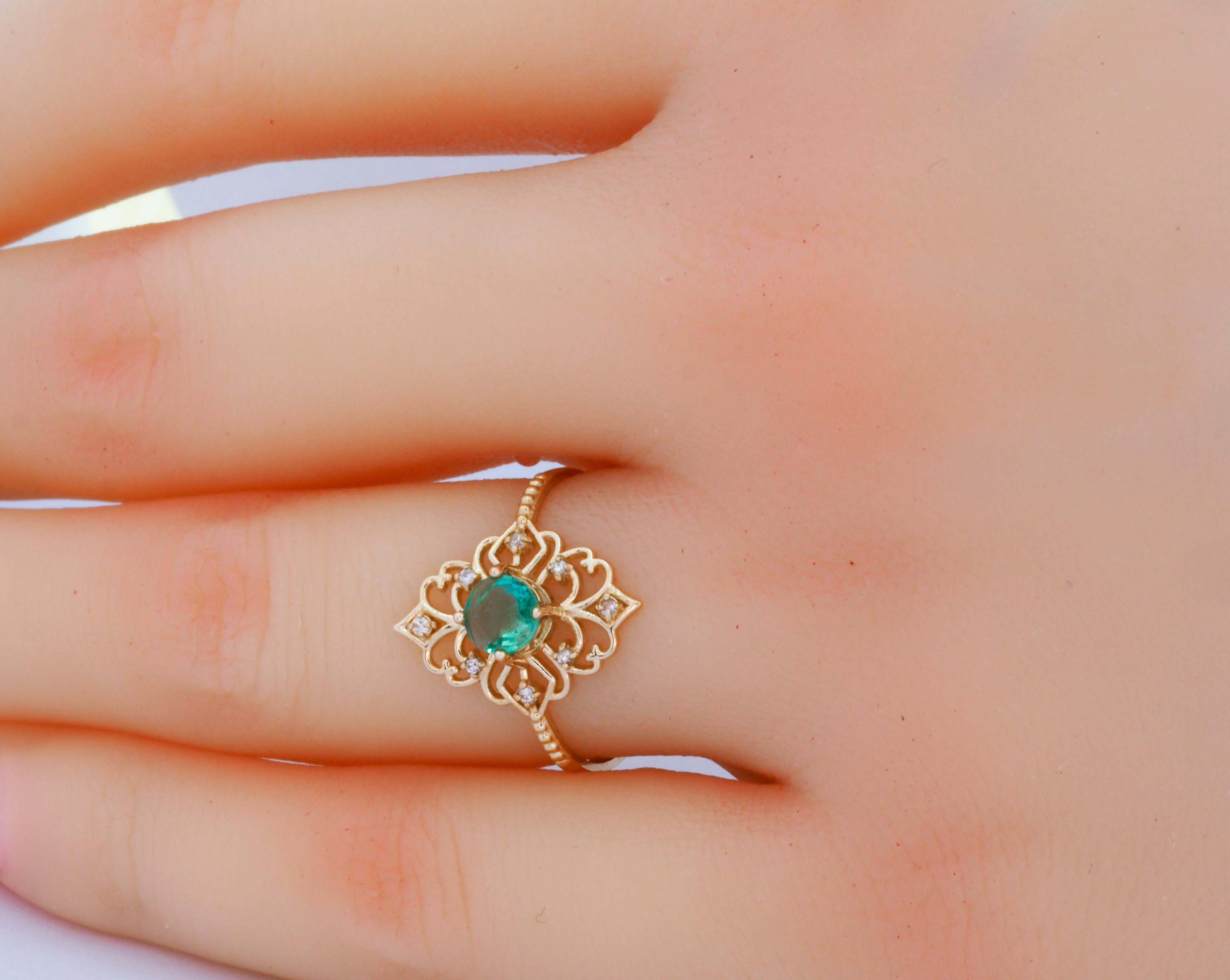 For Sale:  14 K Gold Ring with Emerald and Diamonds 14