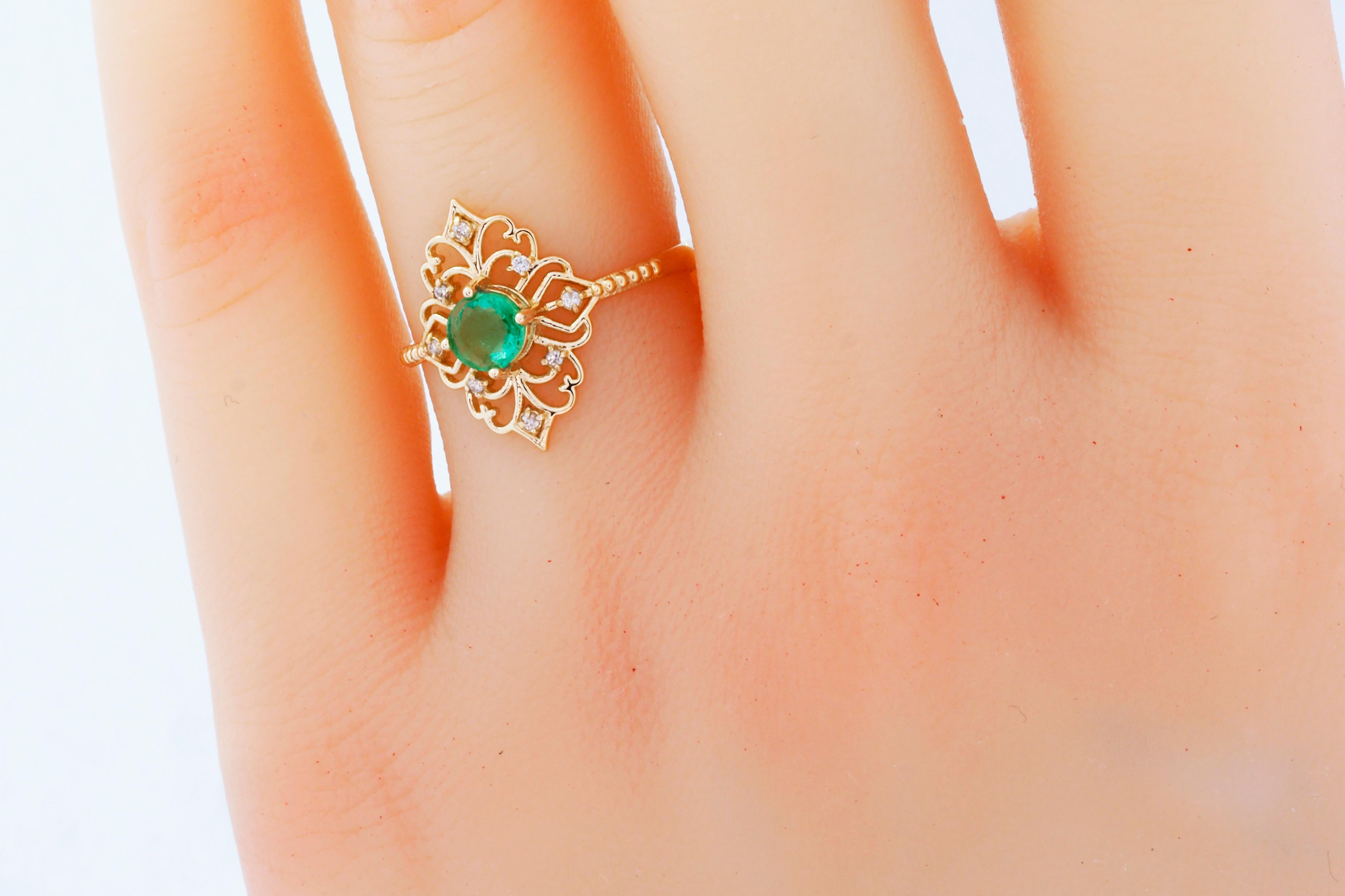 For Sale:  14 K Gold Ring with Emerald and Diamonds 15