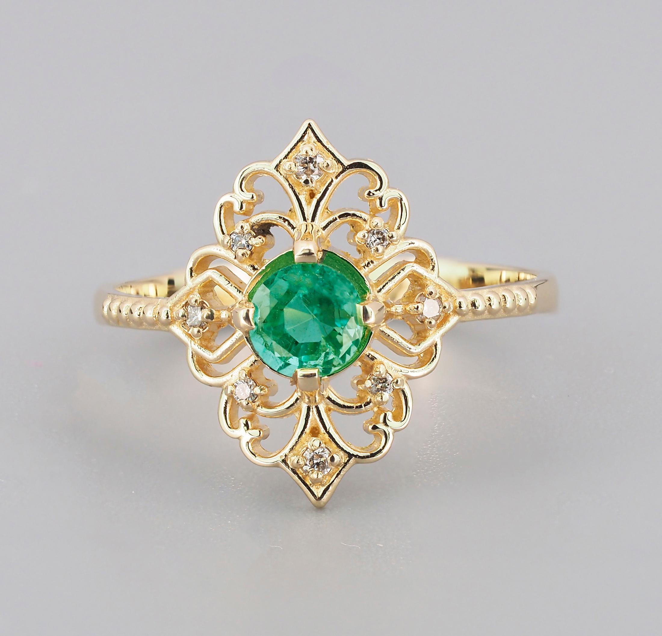 For Sale:  14 K Gold Ring with Emerald and Diamonds 16