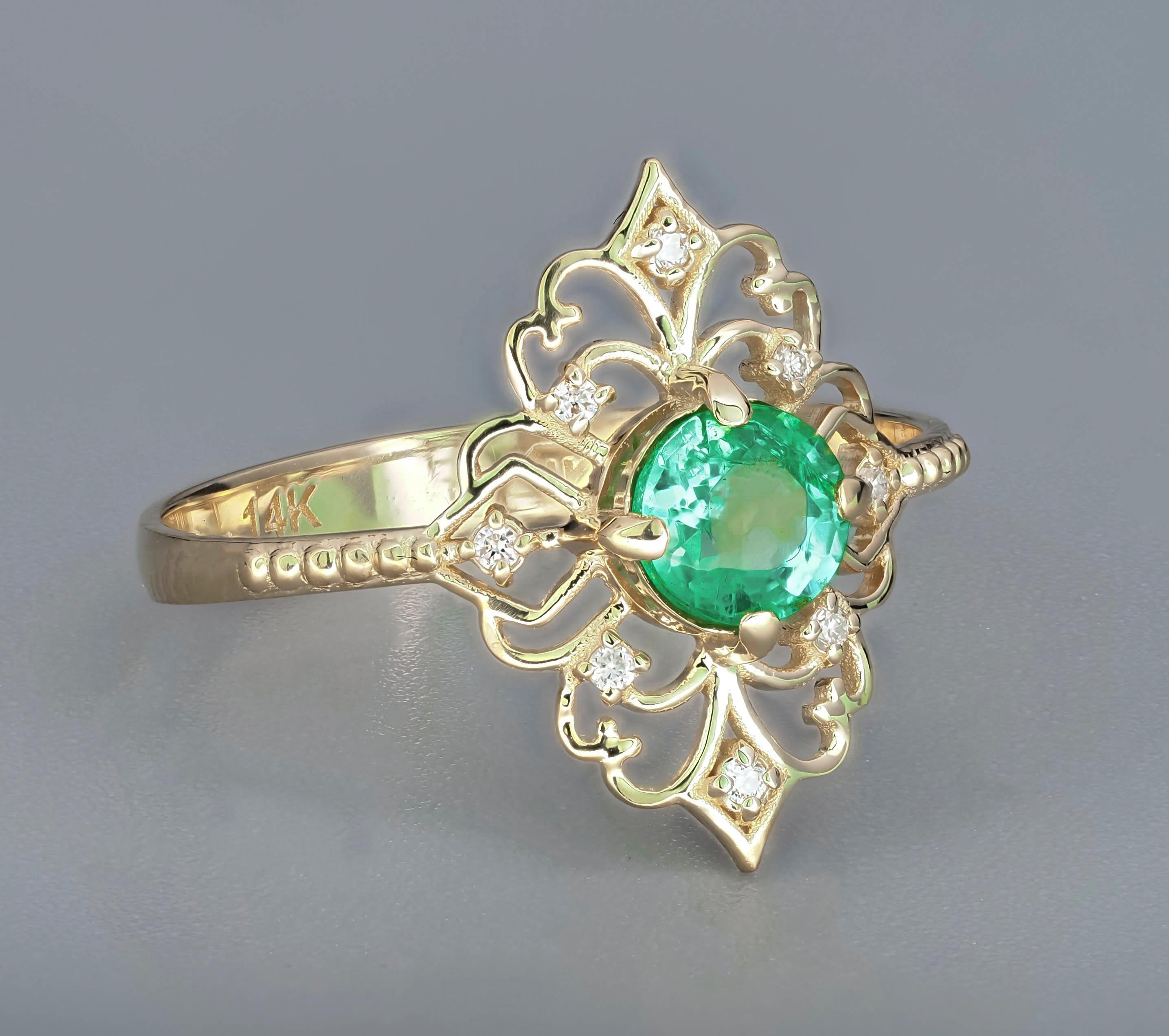 For Sale:  14 K Gold Ring with Emerald and Diamonds 17