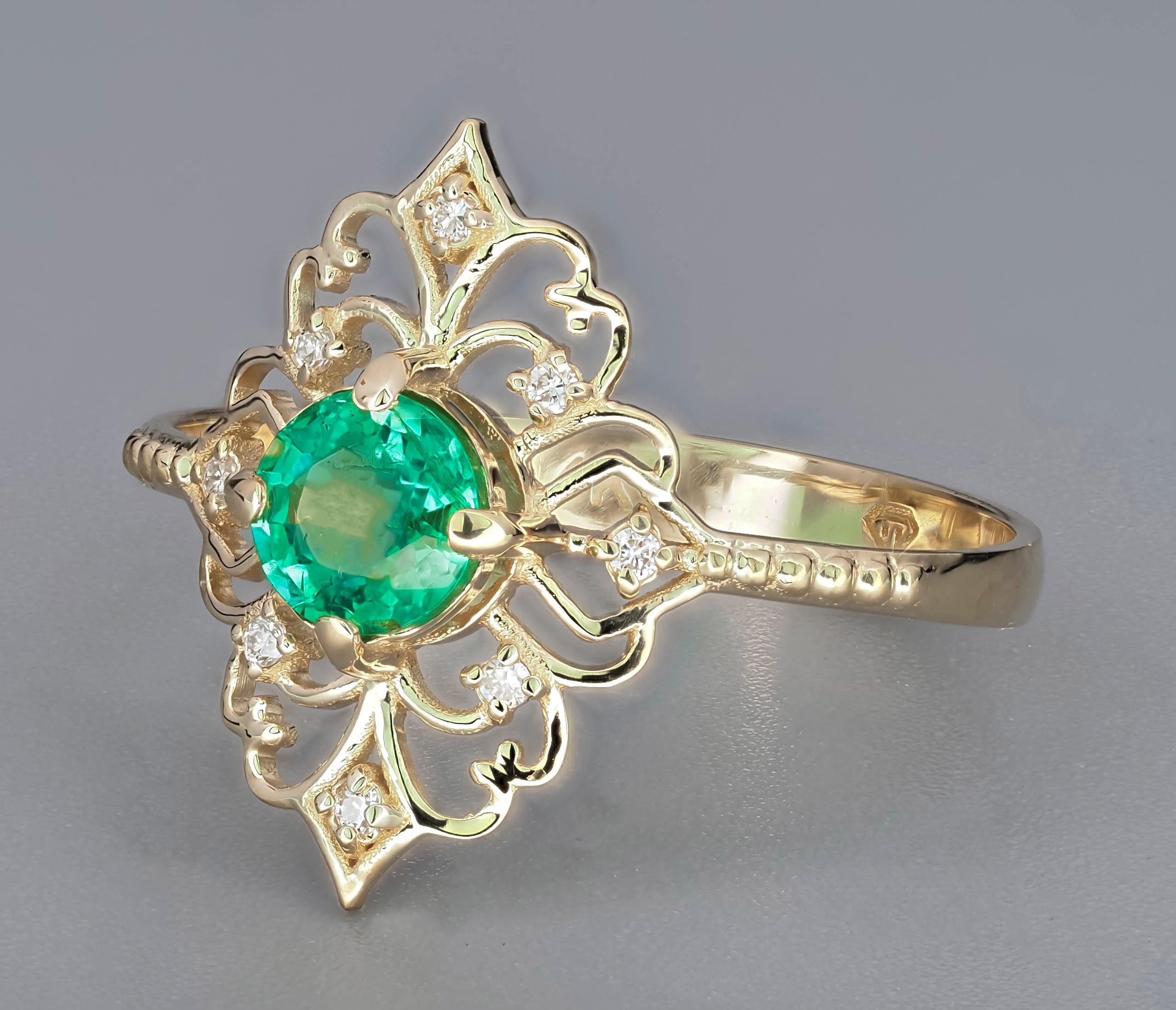 For Sale:  14 K Gold Ring with Emerald and Diamonds 18