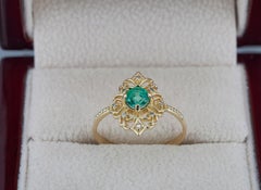 14 K Gold Ring with Emerald and Diamonds