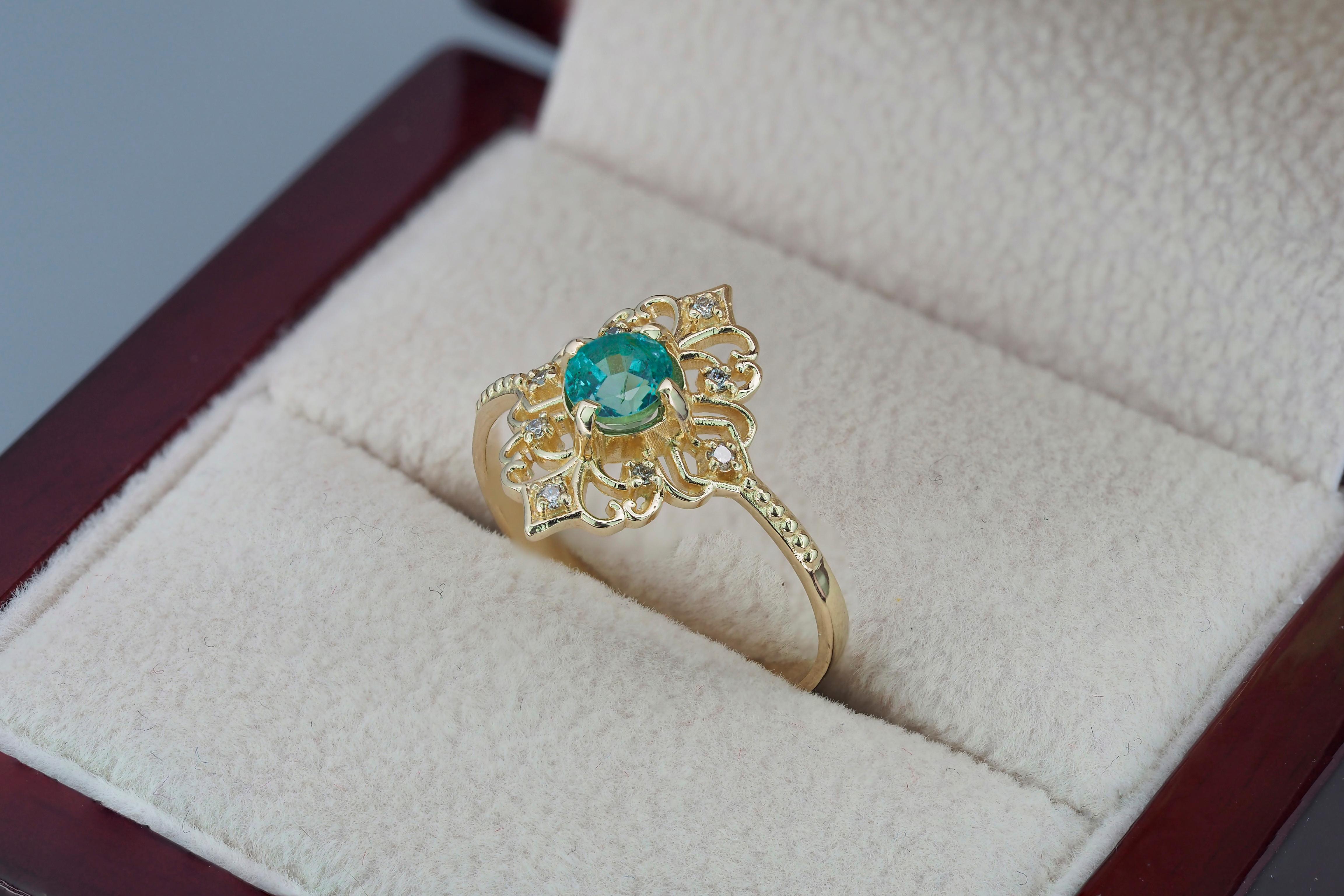 Round Cut 14 K Gold Ring with Emerald and Diamonds