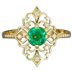 14 K Gold Ring with Emerald and Diamonds