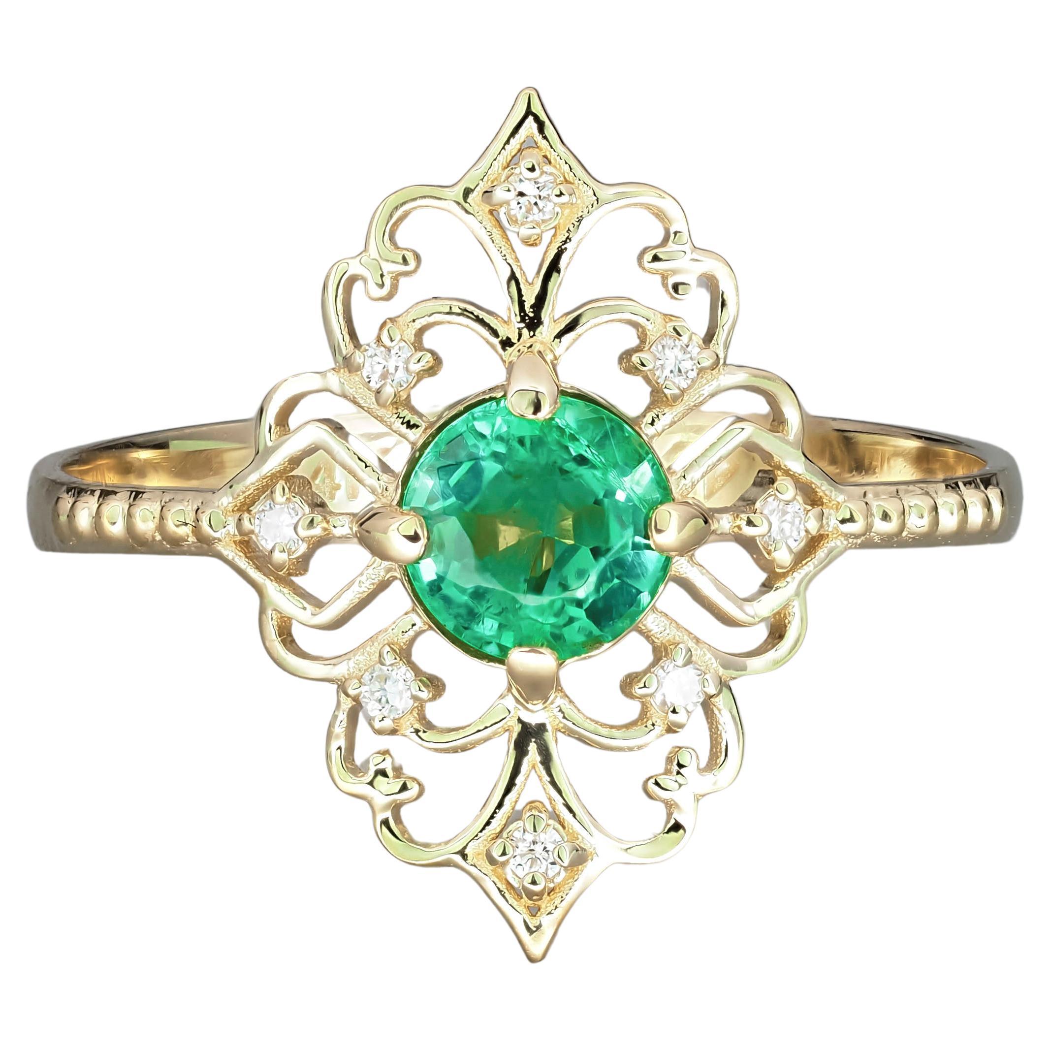 Anillo de Oro de 14 K con Esmeralda y Diamantes