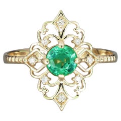 14 K Gold Ring with Emerald and Diamonds
