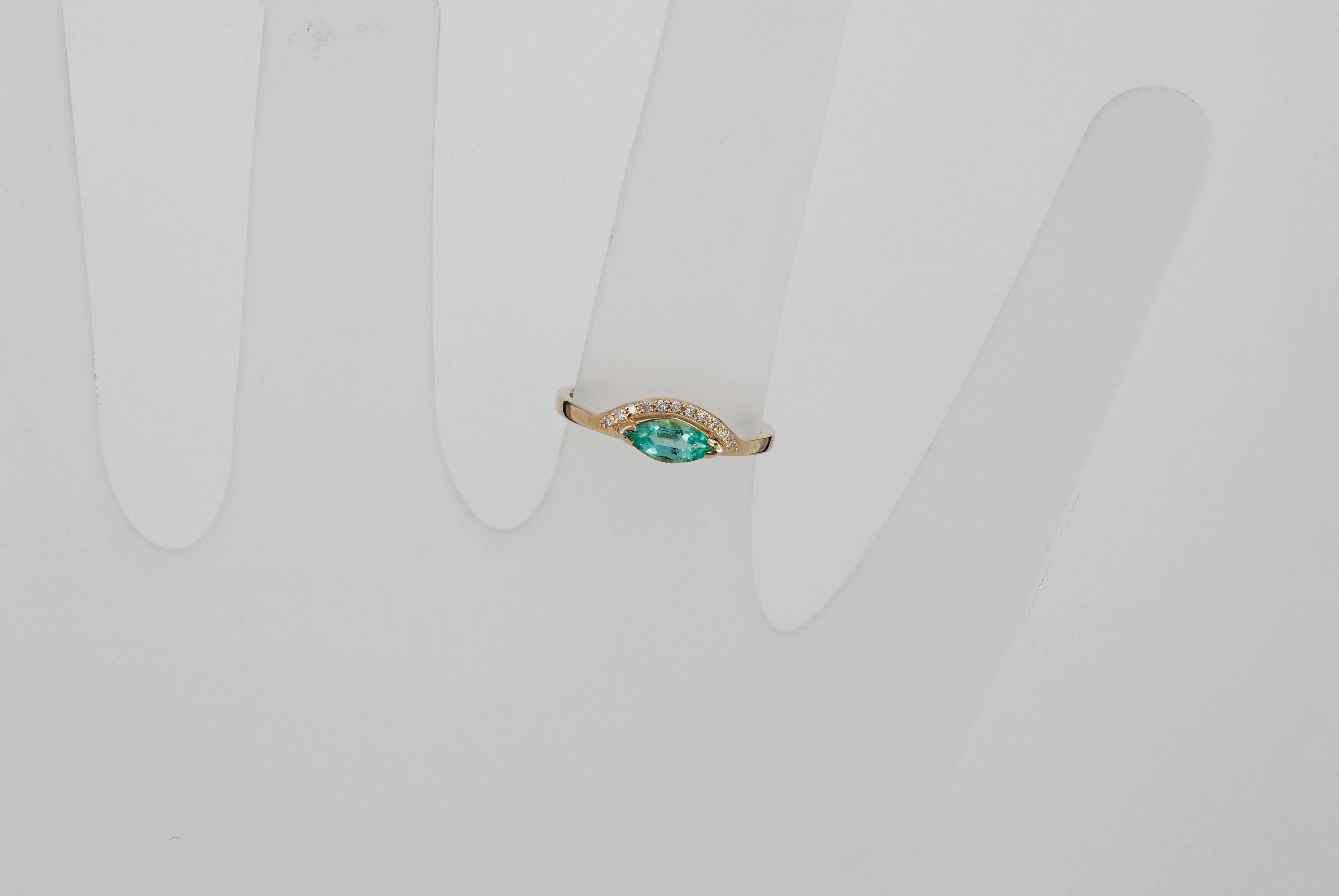 For Sale:  14 K Gold Ring with Marquise Cut Emerald and Diamonds 10