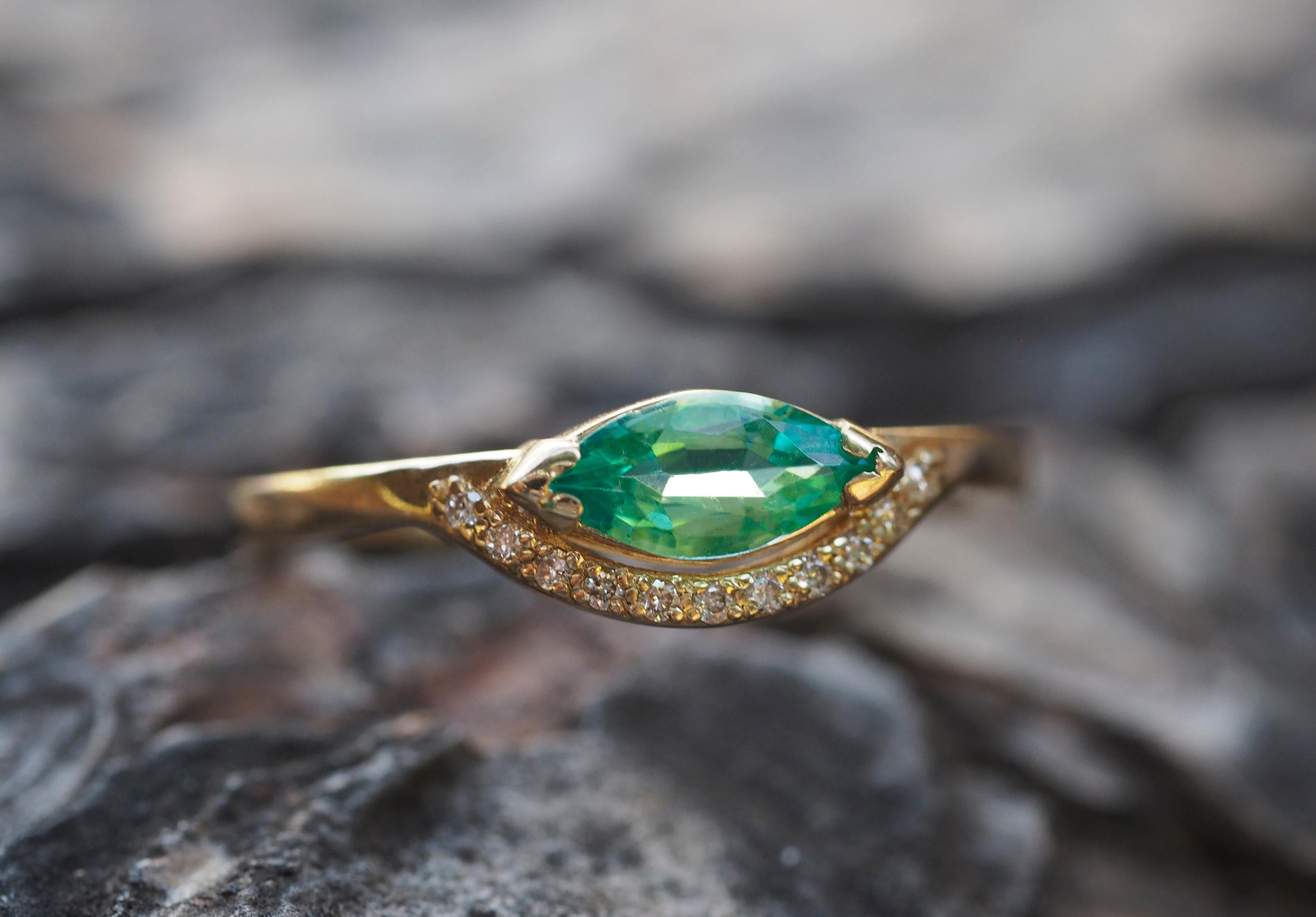 For Sale:  14 K Gold Ring with Marquise Cut Emerald and Diamonds 13