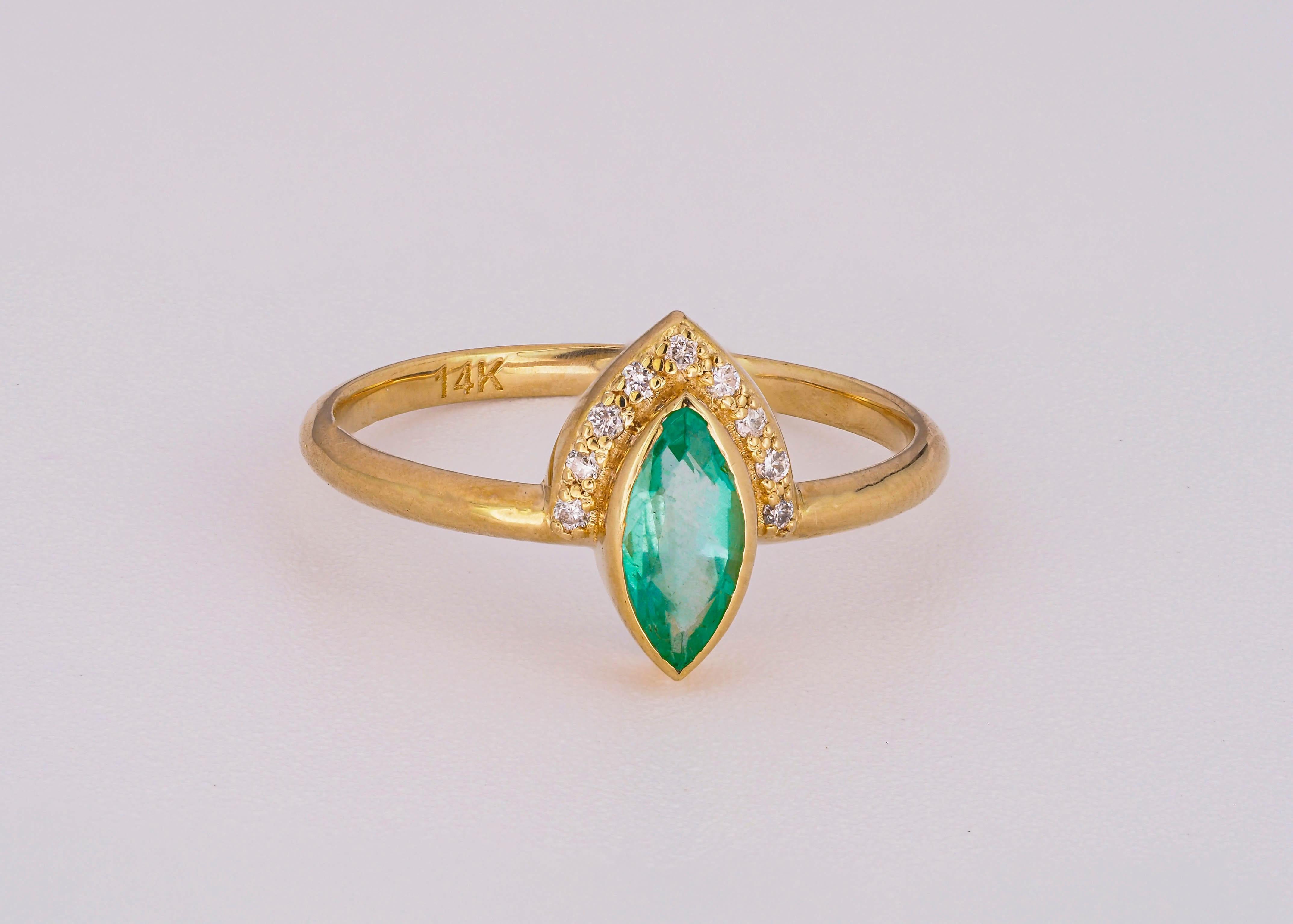 For Sale:  14 K Gold Ring with Marquise Cut Emerald and Diamonds 15