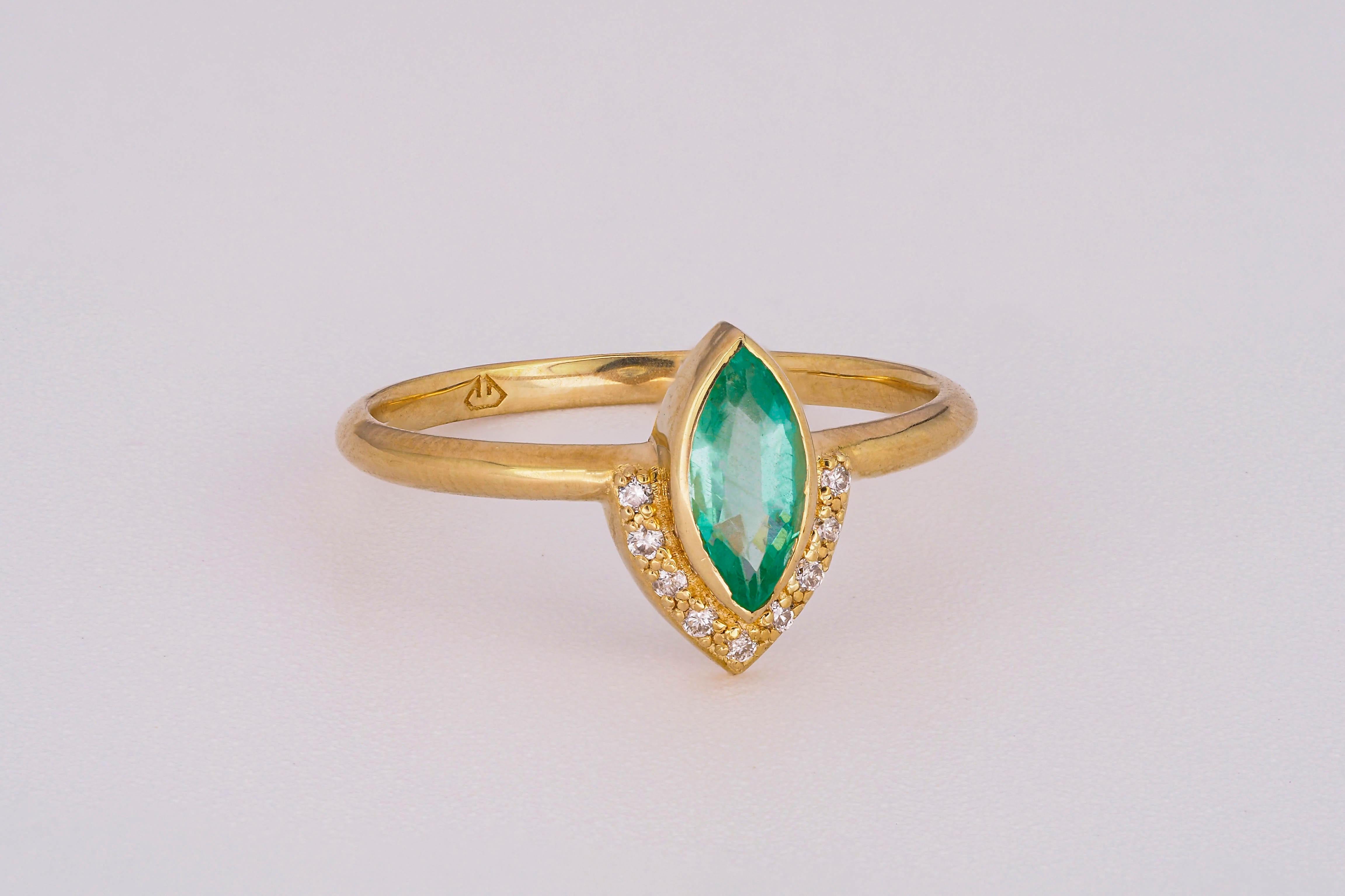 For Sale:  14 K Gold Ring with Marquise Cut Emerald and Diamonds 17