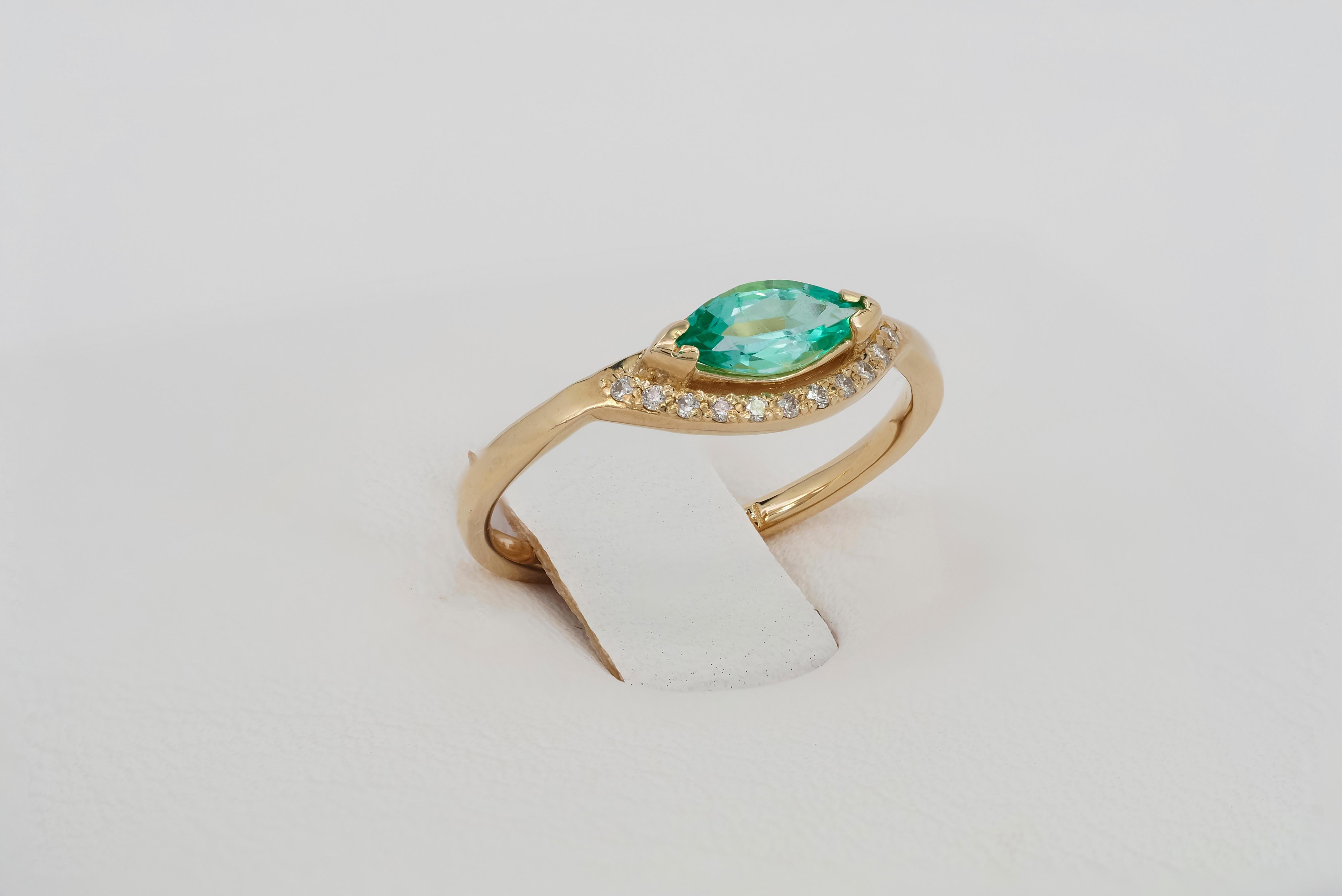 For Sale:  14 K Gold Ring with Marquise Cut Emerald and Diamonds 6