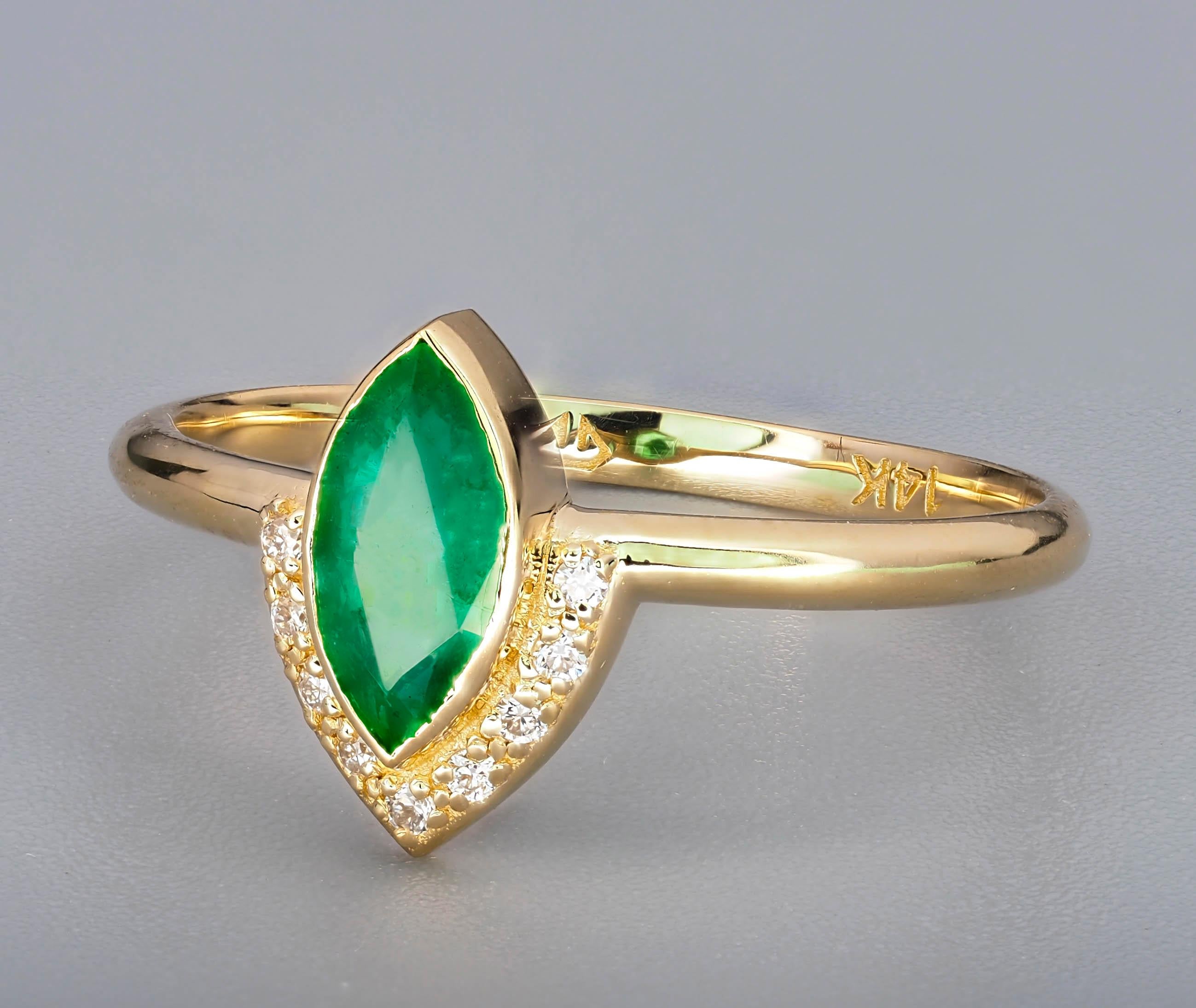 For Sale:  14 K Gold Ring with Marquise Cut Emerald and Diamonds 6
