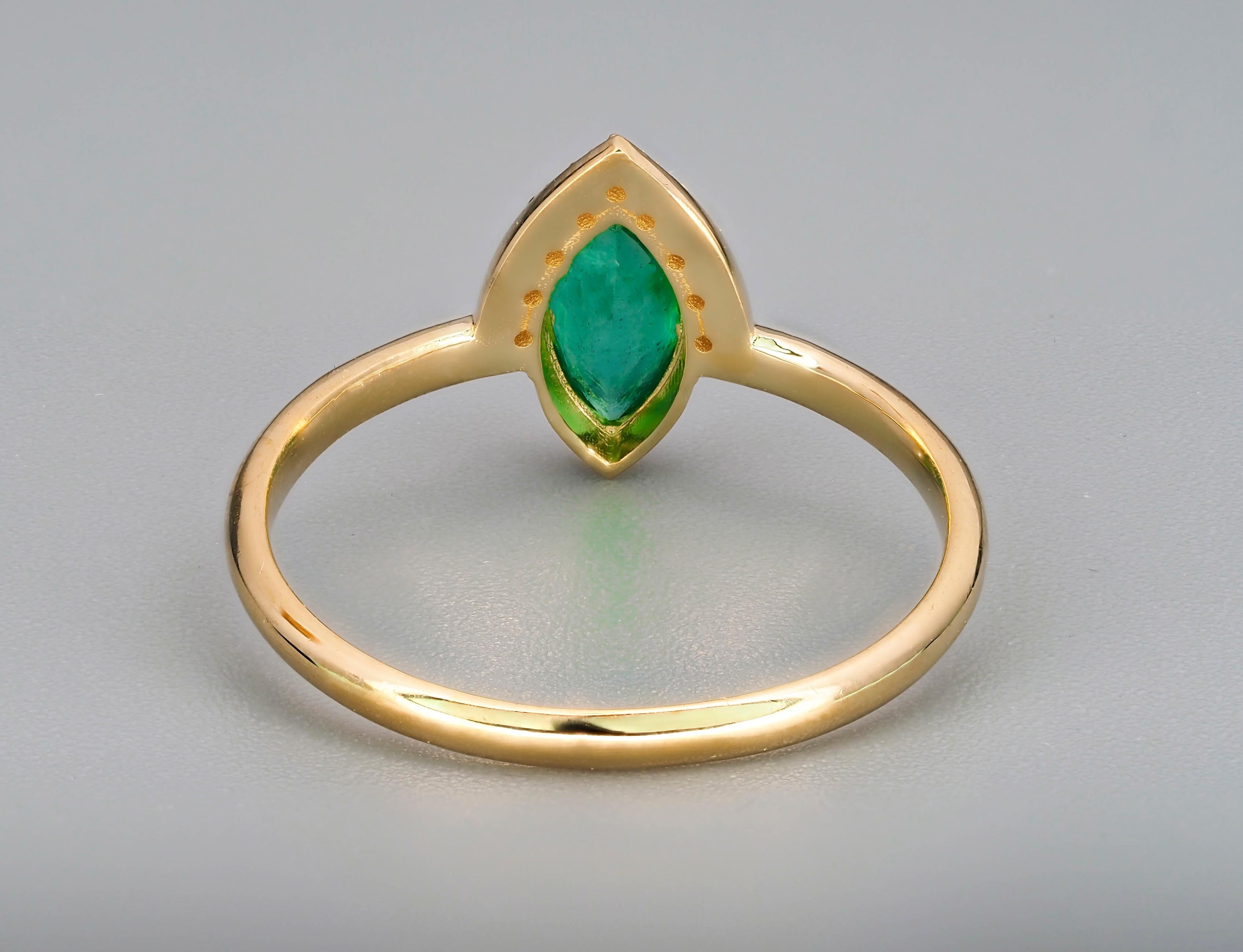 For Sale:  14 K Gold Ring with Marquise Cut Emerald and Diamonds 7