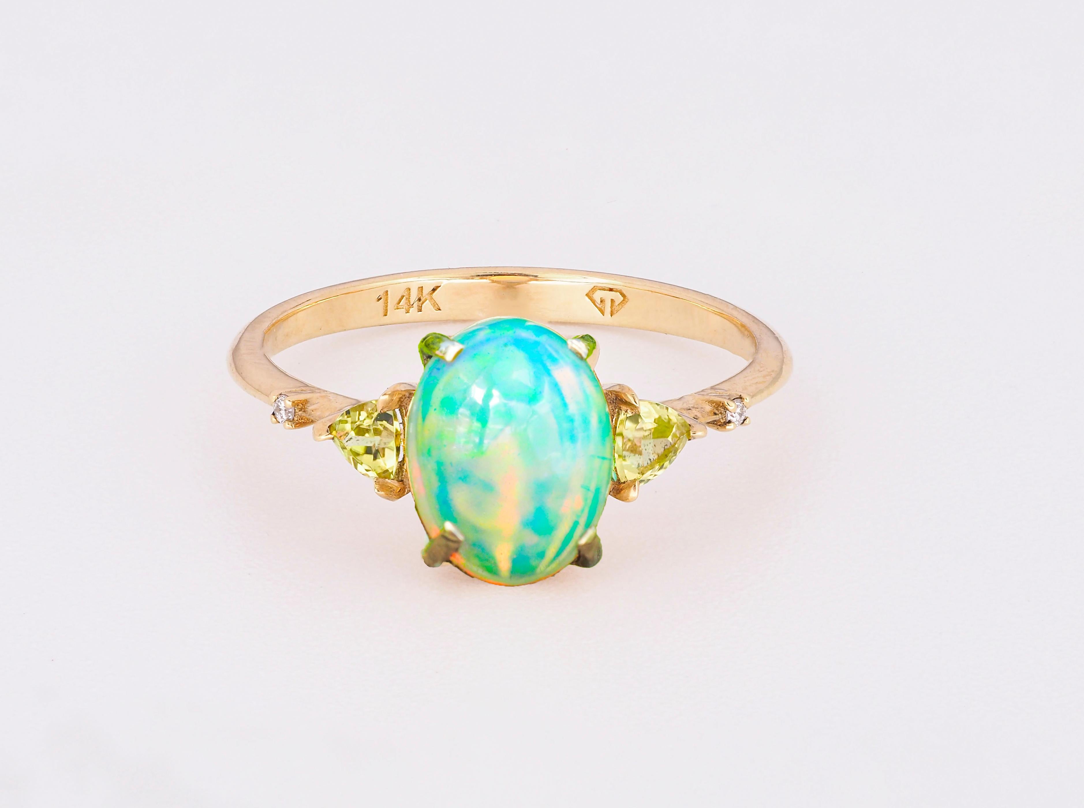 Modern 14 k gold ring with opal, peridot, diamonds.  For Sale