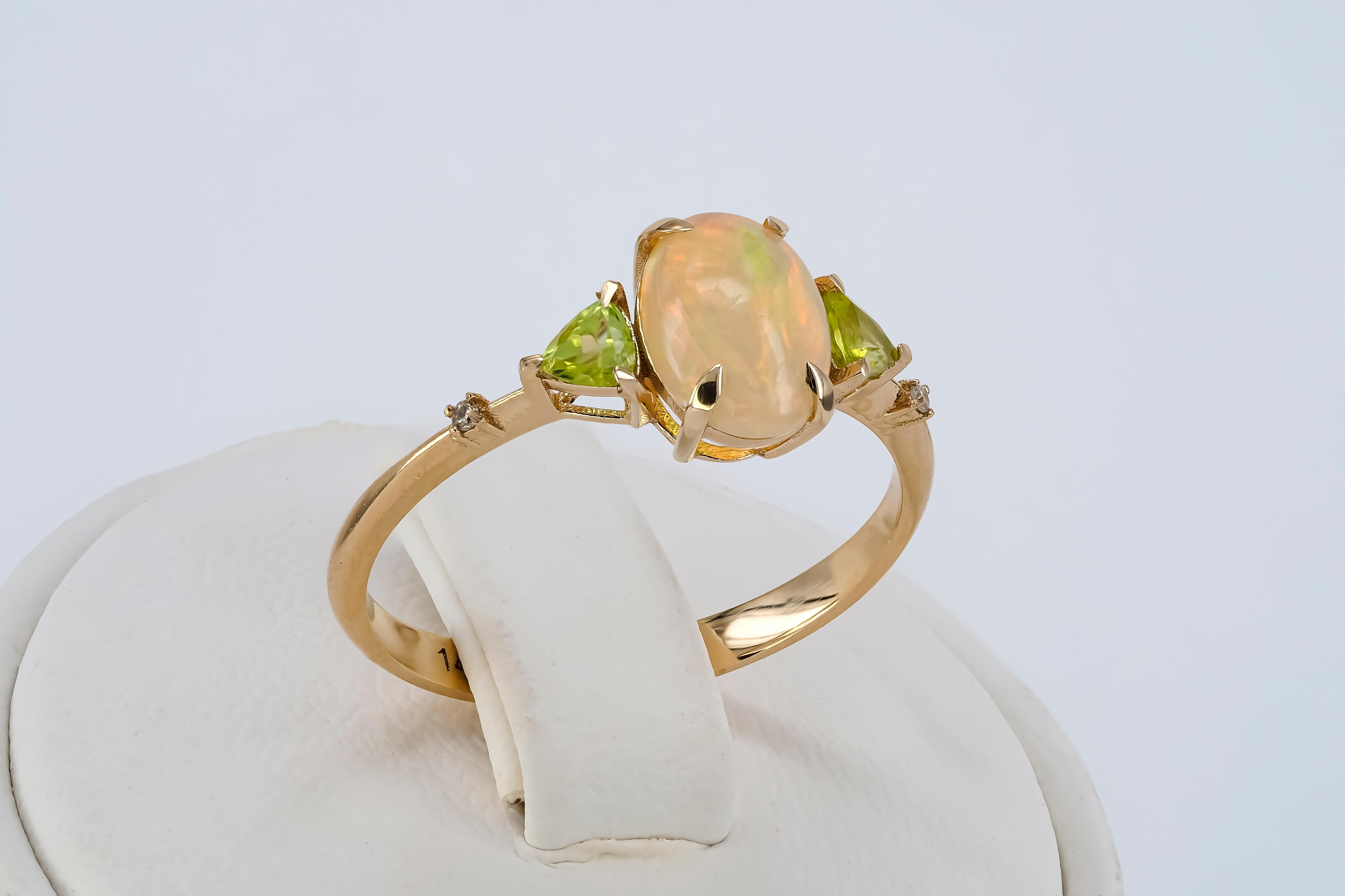Women's 14 k gold ring with opal, peridot, diamonds.  For Sale