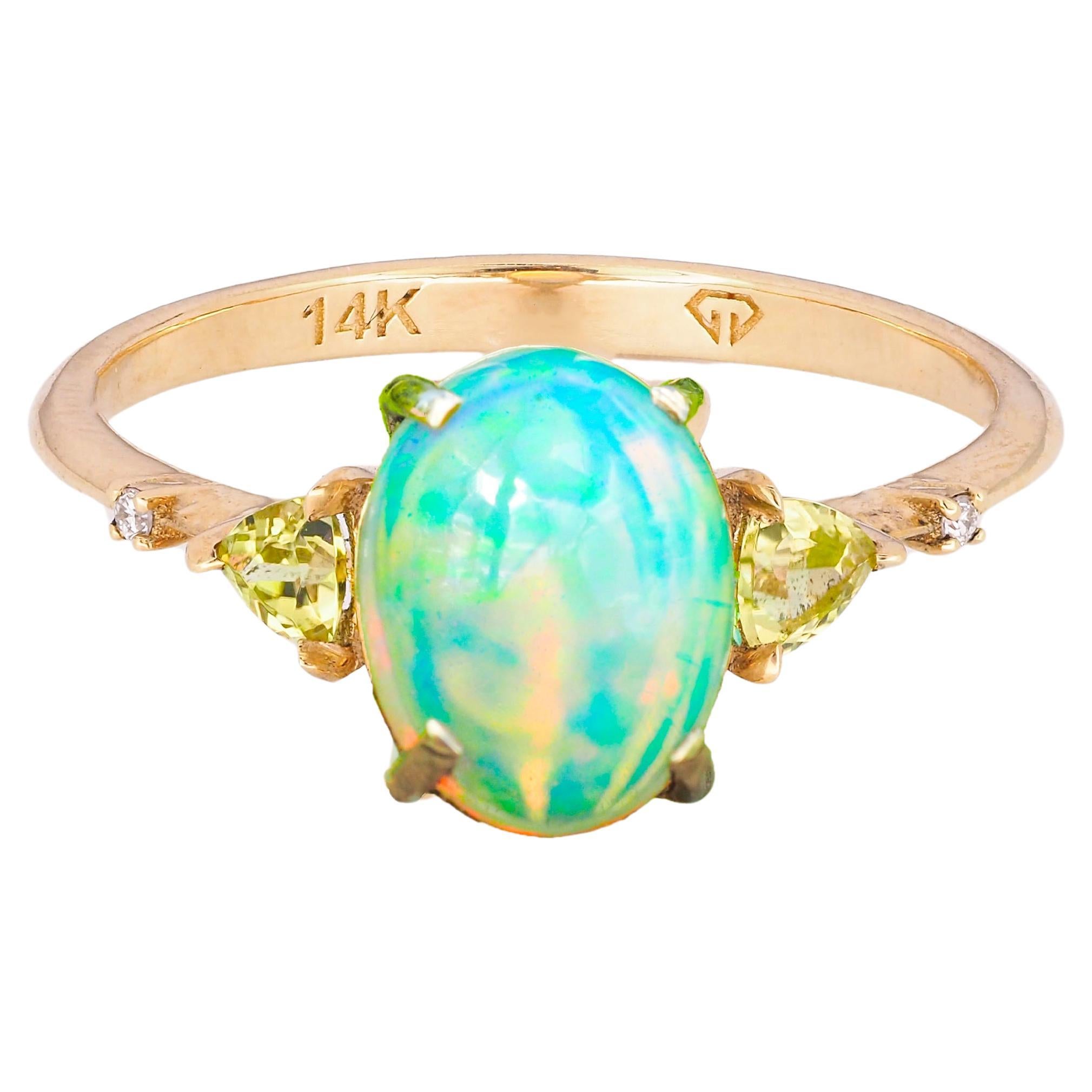 14 k gold ring with opal, peridot, diamonds.  For Sale