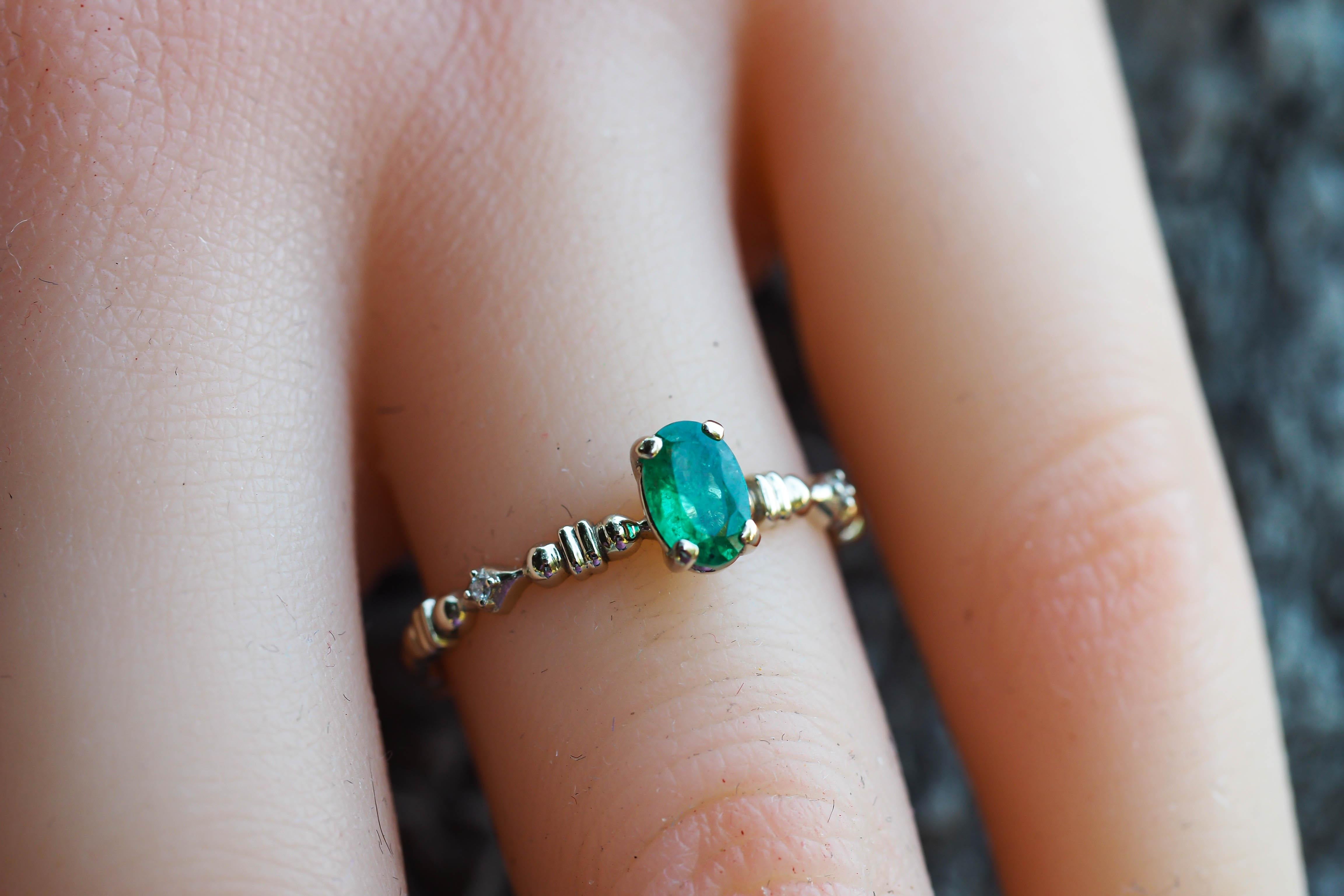 For Sale:  14 K Gold Ring with Oval Emerald and Diamonds 12