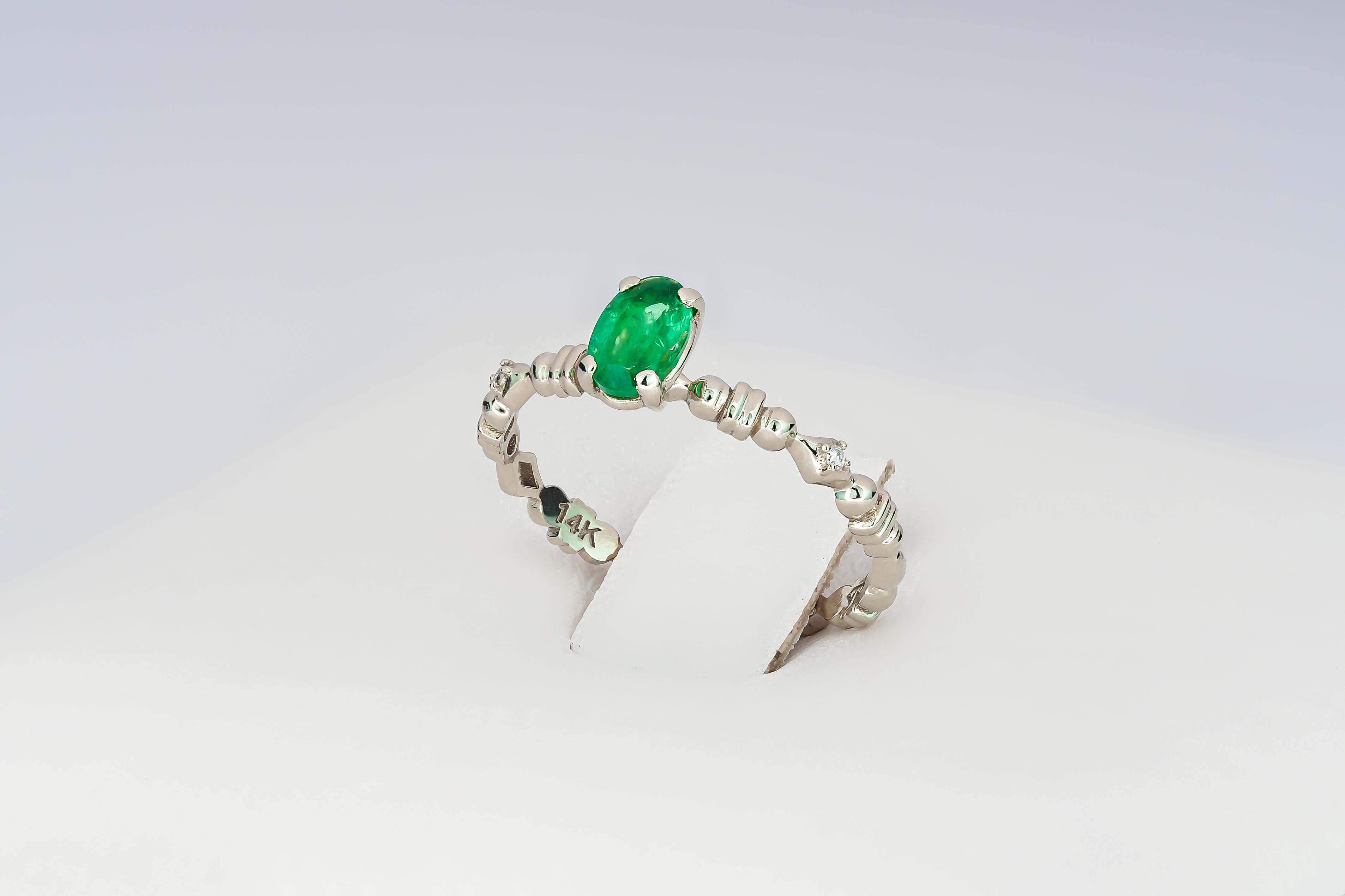For Sale:  14 K Gold Ring with Oval Emerald and Diamonds 7