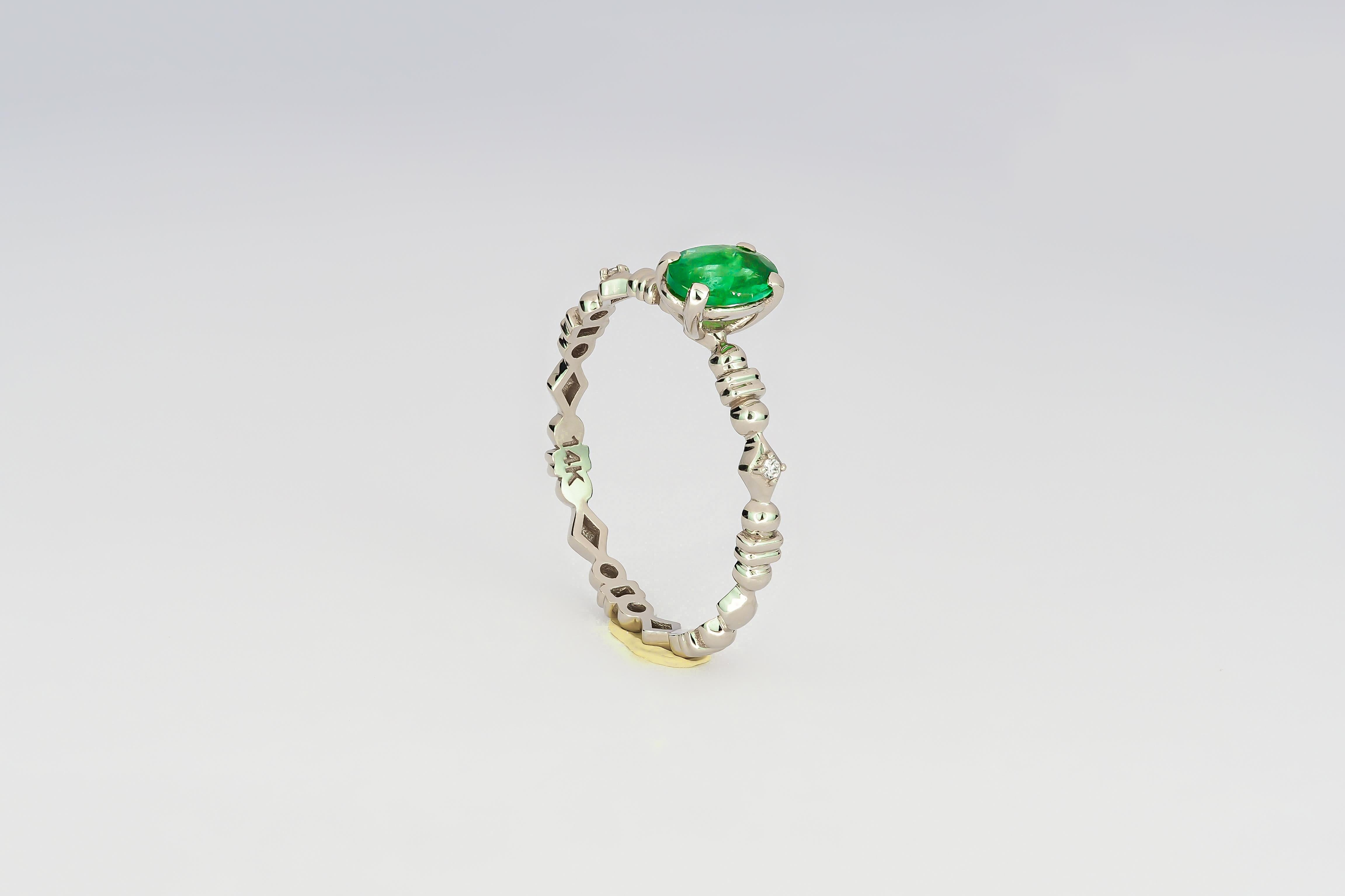 For Sale:  14 K Gold Ring with Oval Emerald and Diamonds 8