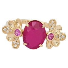 14 Karat Gold Ring with Ruby and Diamonds. Flower design ruby ring