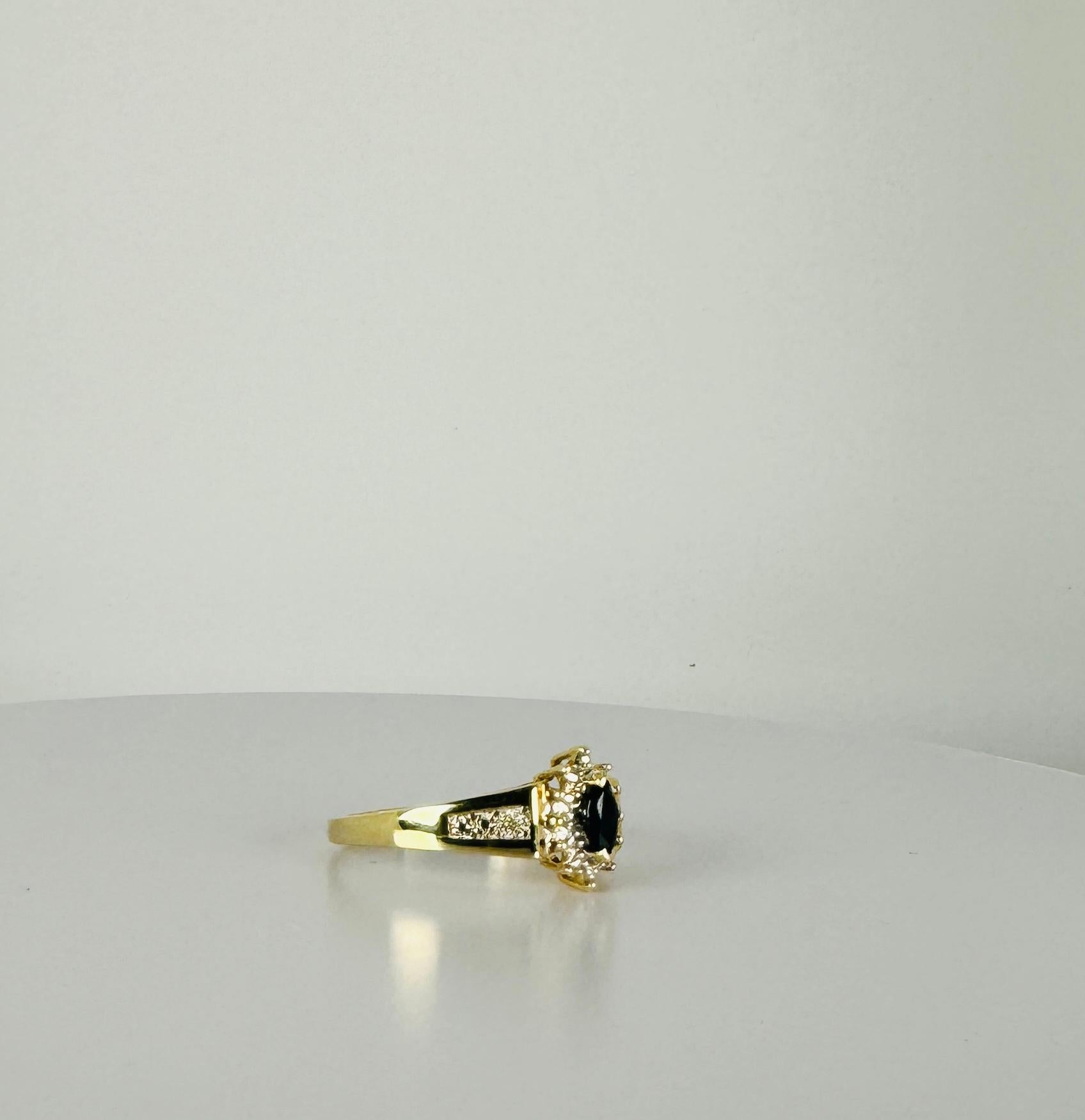Ring aus 14 Karat Gelbgold mit blauem Saphir im Ovalschliff und Stimulationen 7