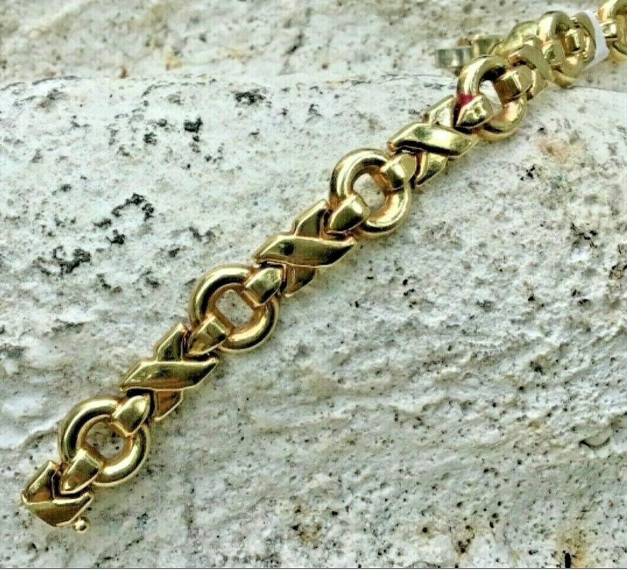 gold x and o bracelet