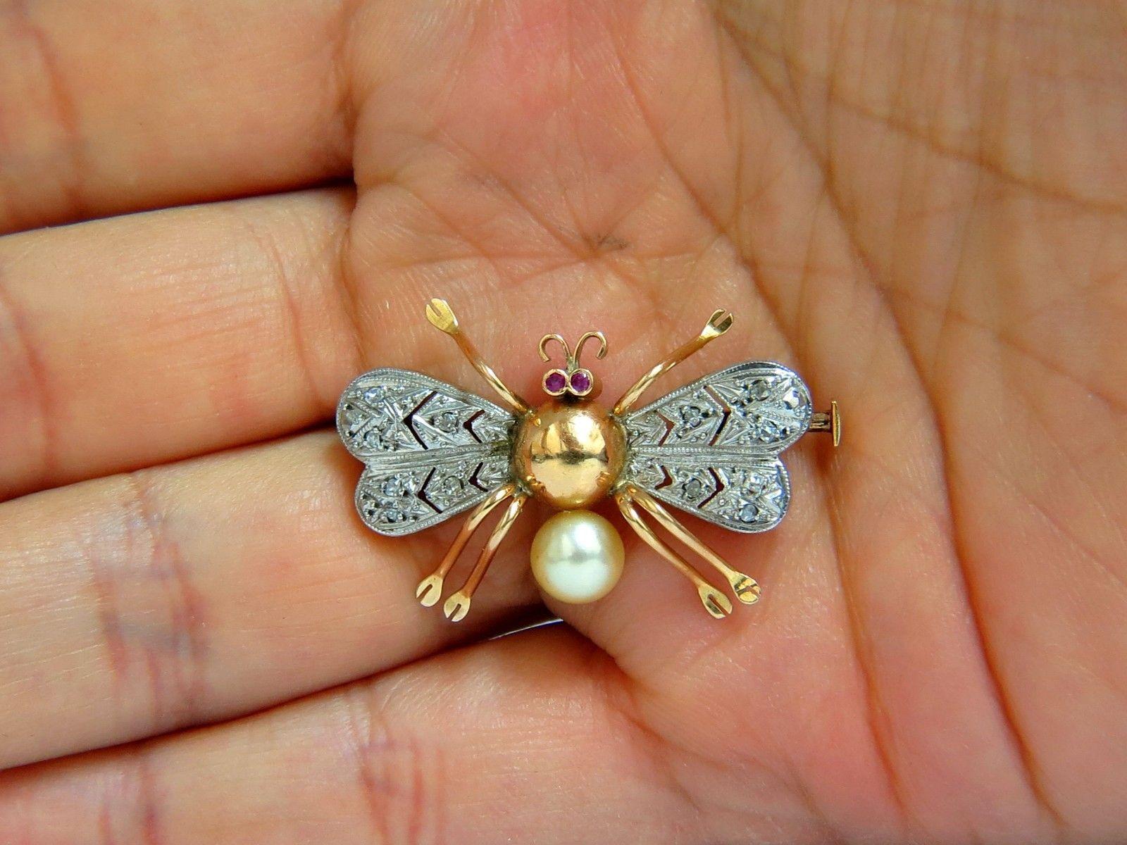 Antique 3D Real Life Insect Pin.

Excellent new condition.

Natural Pearl, diamonds & ruby in eyes.

Measures: 1.3 X .8 inch.

14kt. yellow gold

6.8 grams