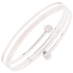 14 Karat 4 Band Wrap Bracelet with Diamond Bezel Ends White Gold