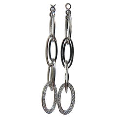 Pendientes colgantes de diamantes ovalados alargados de 14 quilates y 0,46 quilates con bisagra