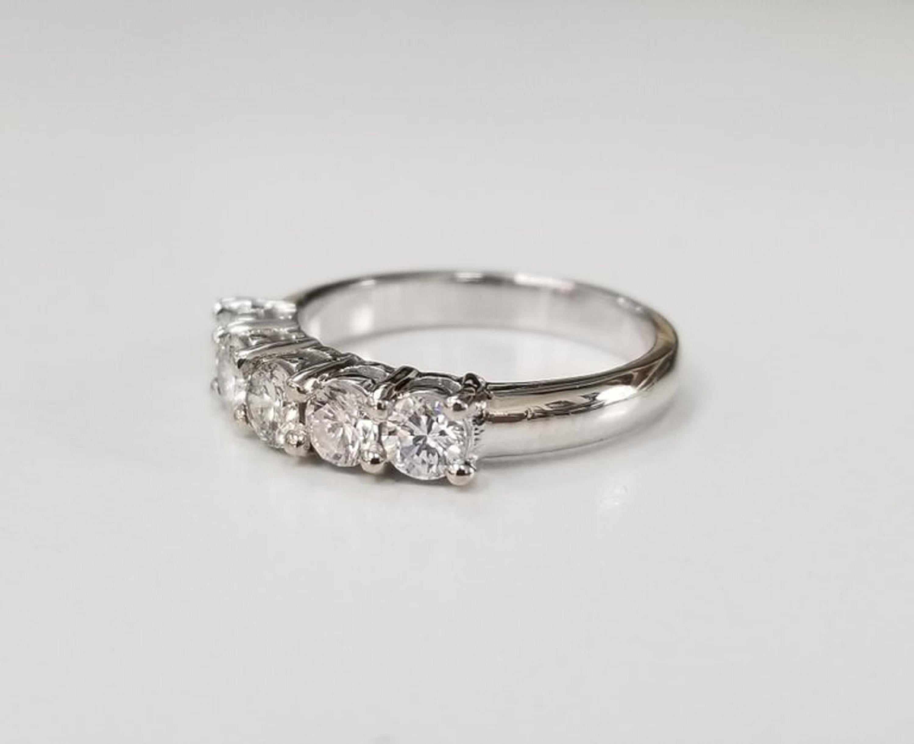 14 karat 5 stone diamond ring weighing .95pts. color 