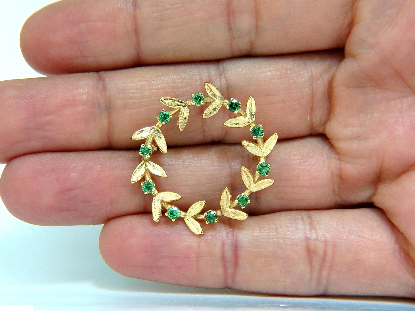 Gorgeous 3D real-life Circular pin

The leaves are of vibrant 3D Detail

Old School, Hand Graver Detailed finish

Natural Green Tsavorites

.65ct

Rounds, Full Cuts 

Vs- Clarity

Diameter measurement of pin:

1.29 Inch wide.

5 grams

Marked &