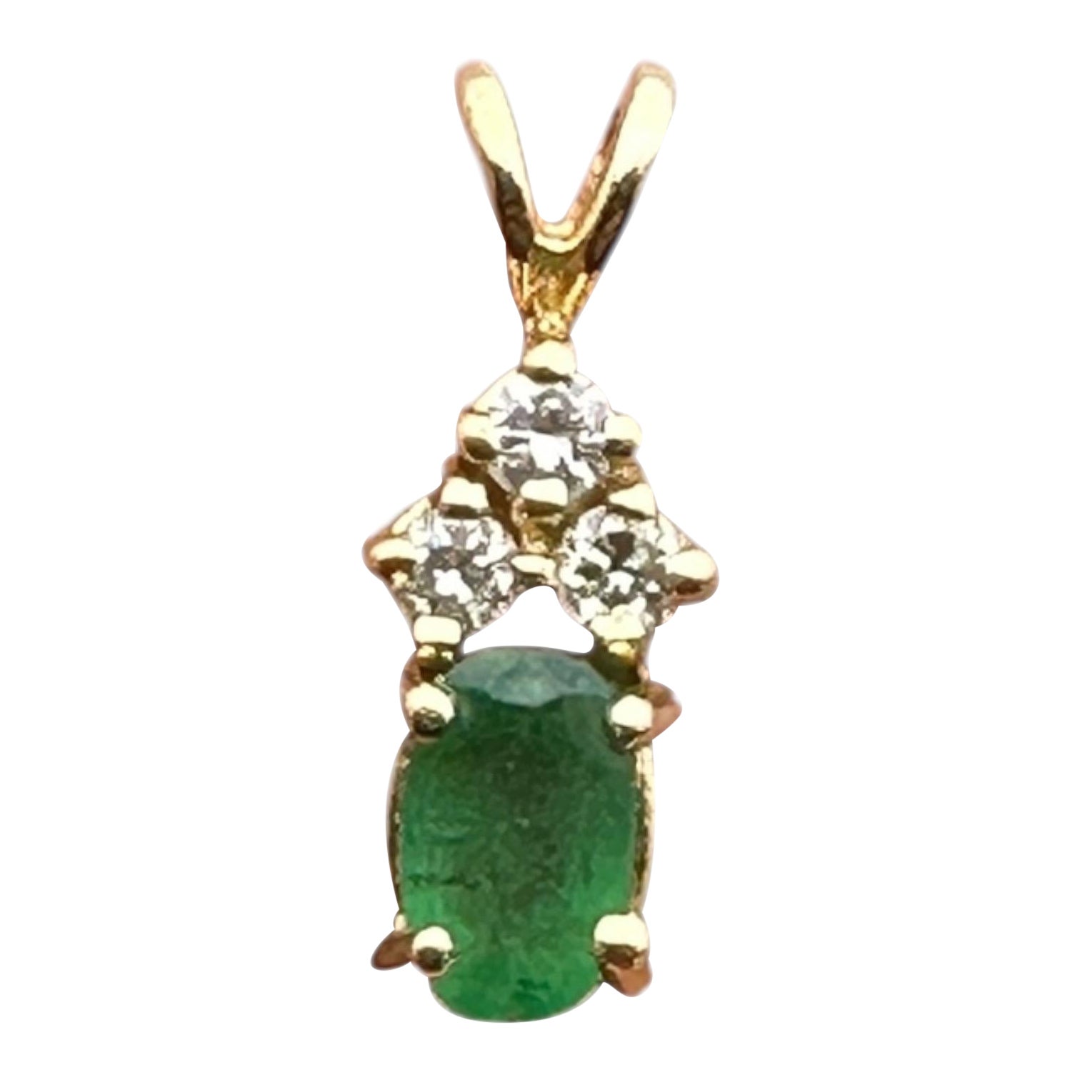 14 Karat .65 Carat Oval-Shaped Emerald and Diamond Pendant For Sale