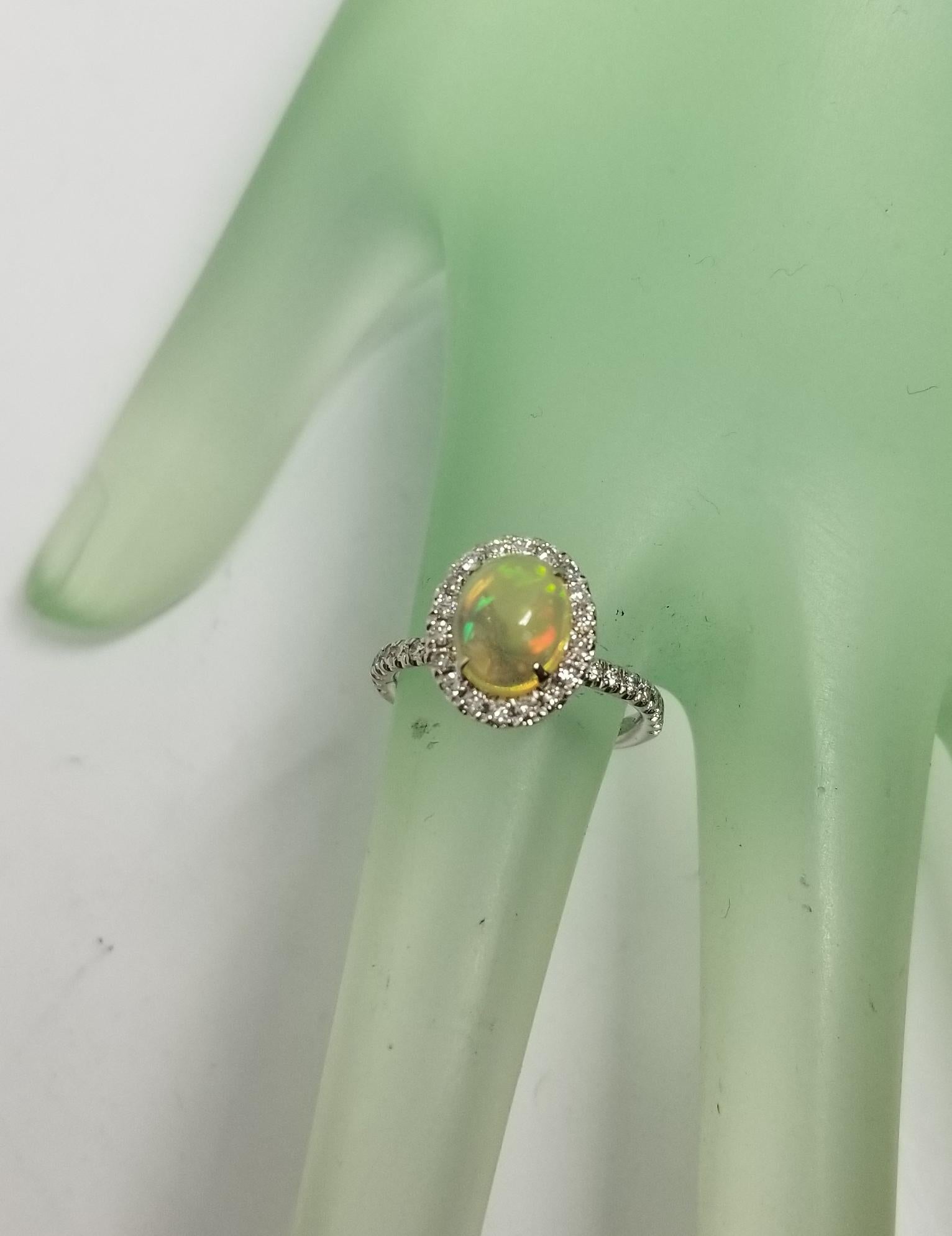 Contemporary 14 Karat African Opal and Diamond Ring