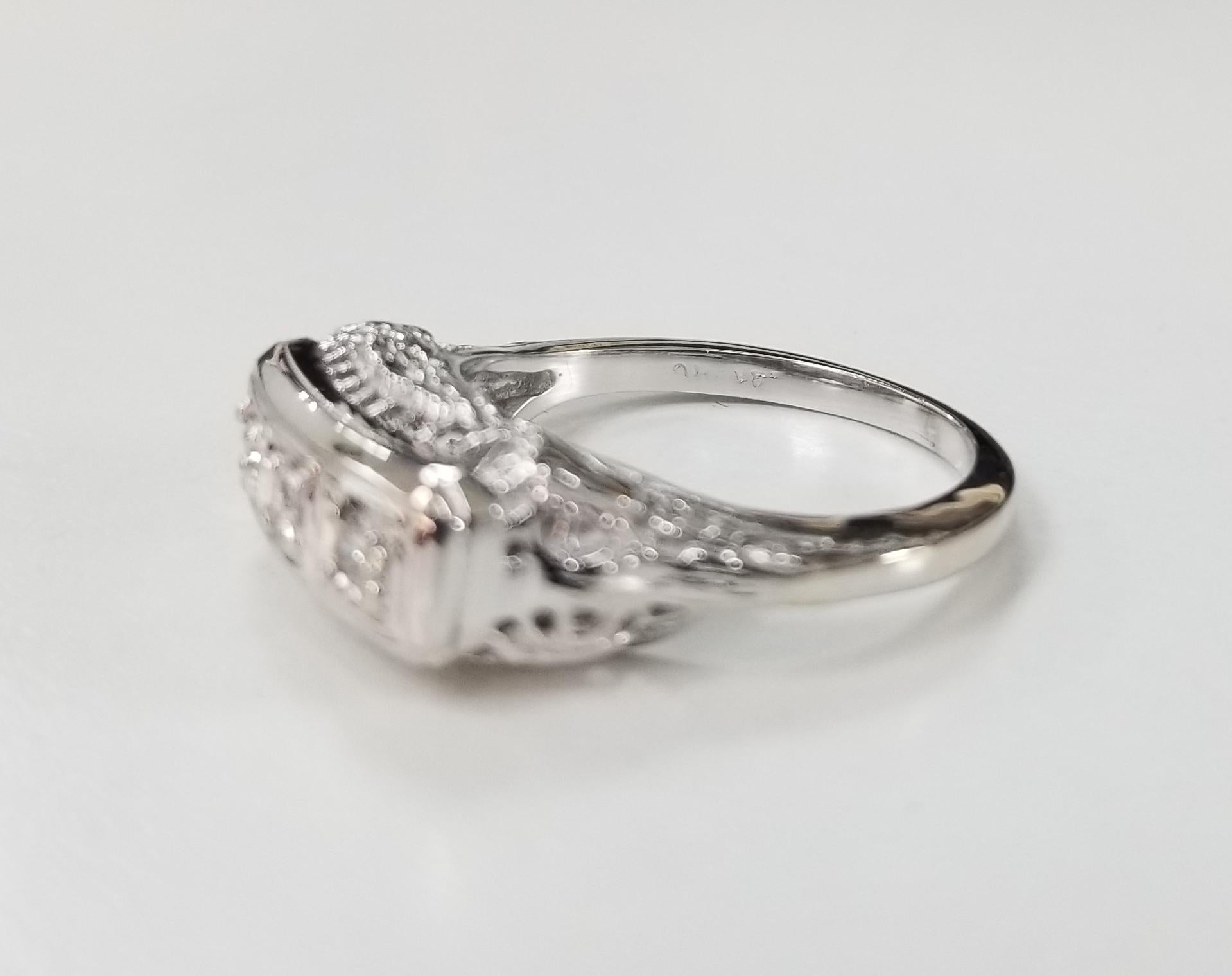 14 karat Art Deco Style 3 stone diamond filigree ring, containing 3 old single cut diamonds of very fine quality weighing .15pts. ring is 7 and can be size to fit for free.