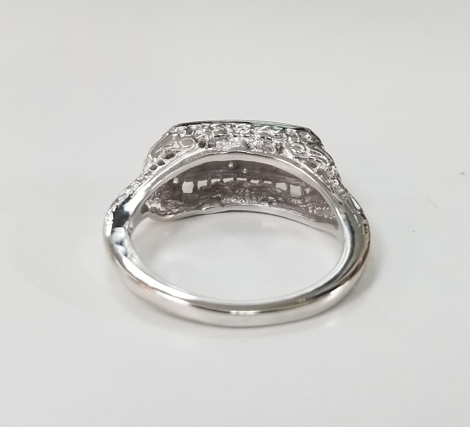 art deco three stone diamond ring