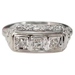 14 Karat Art Deco Style 3-Stone Diamond Filigree Ring