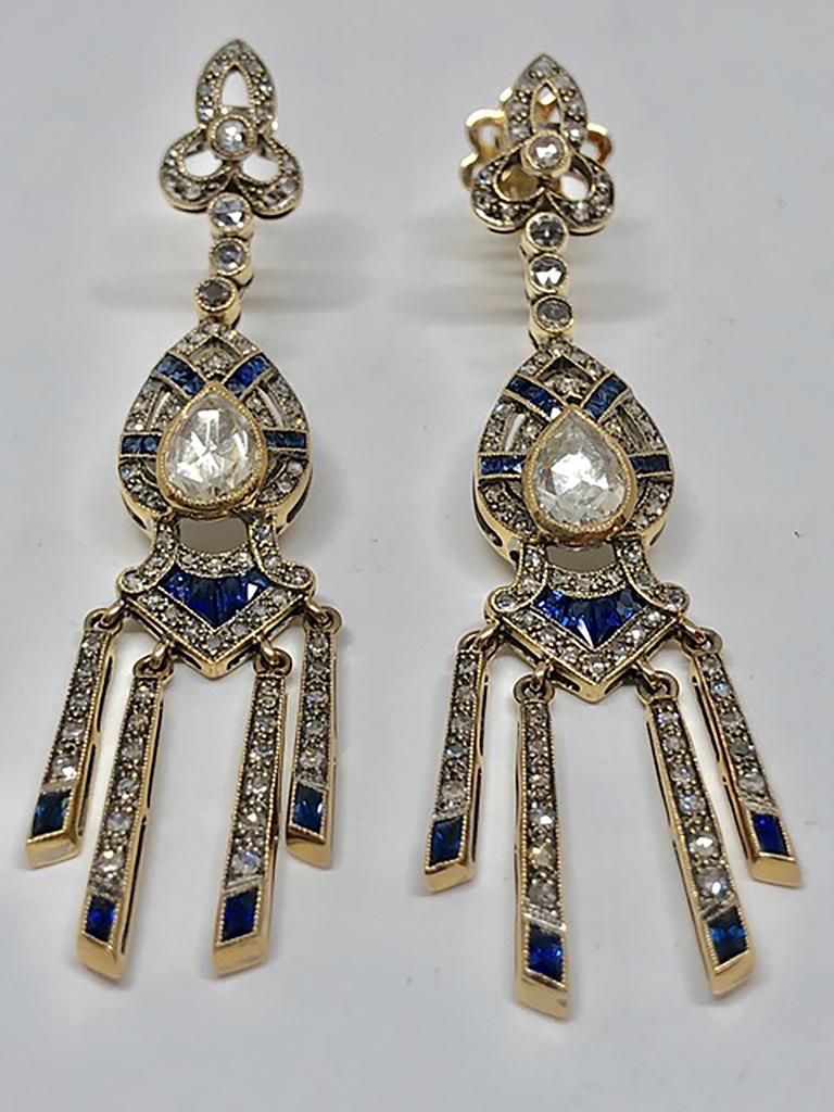 4 Art Deco earrings, circa 1920’s 
Pear cut diamond millegrained bezel set in 14Kt yellow gold 
Approx 1.5 cts of bezel set rose cut diamonds / bead-set rose and single cut diamonds