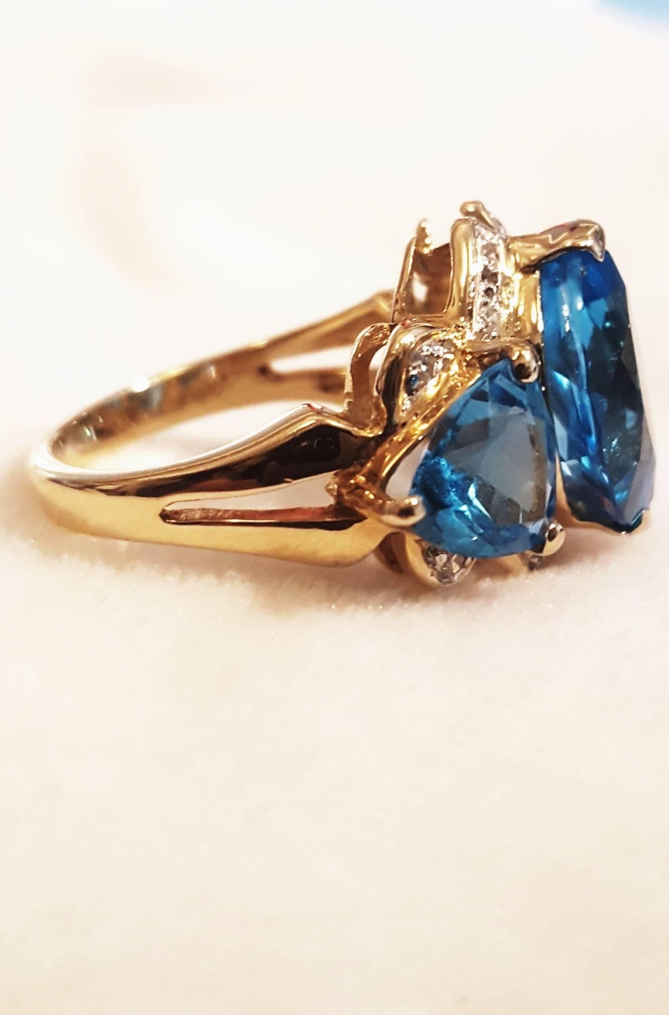 Contemporary 14 Karat Beautiful Blue Topaz and Diamond Ring For Sale