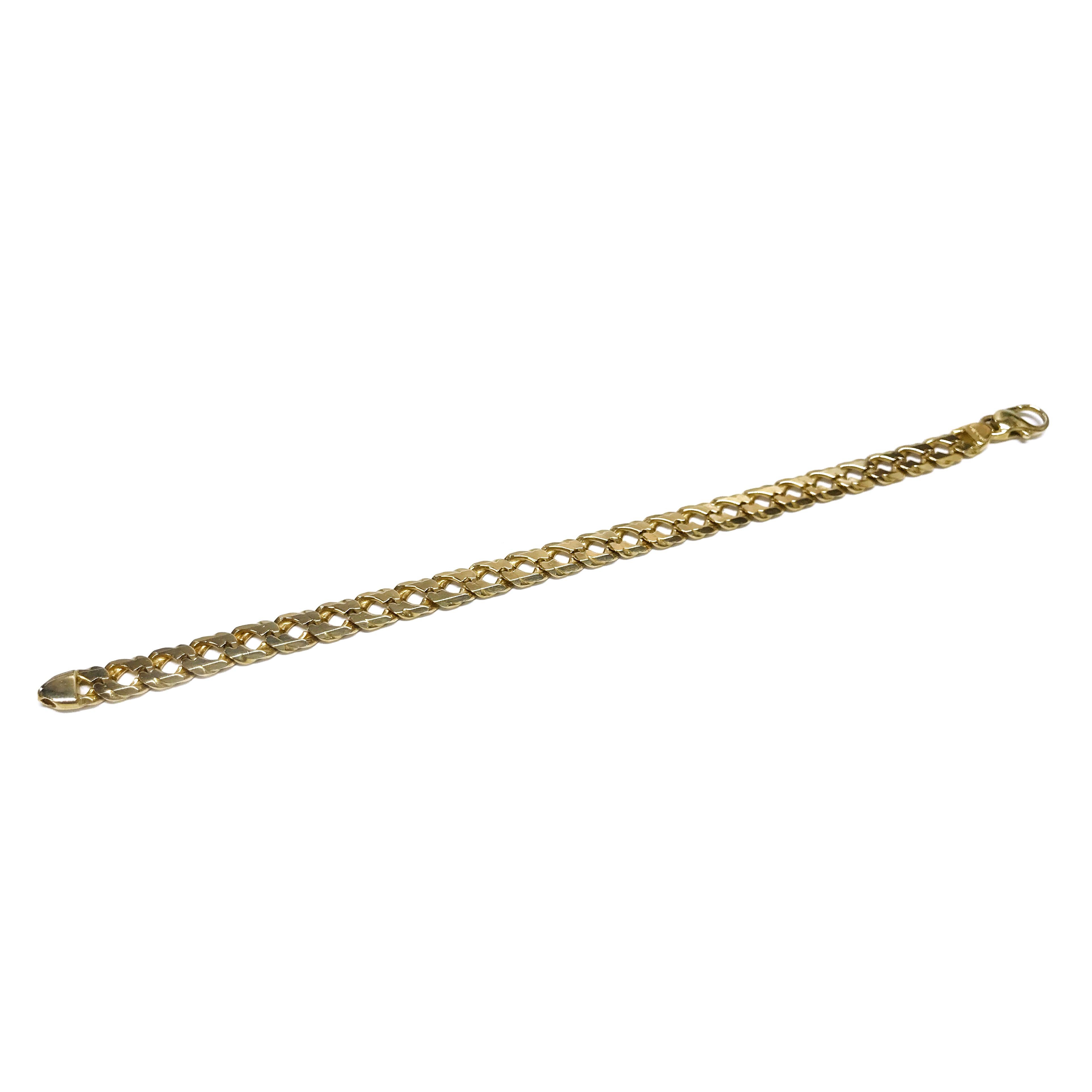 14 Karat Beveled Curb-Link Bracelet. This bracelet features 7.5mm beveled curb links. The top of the bracelet is a shiny finish while the bottom is a matte finish. The bracelet is 8.5